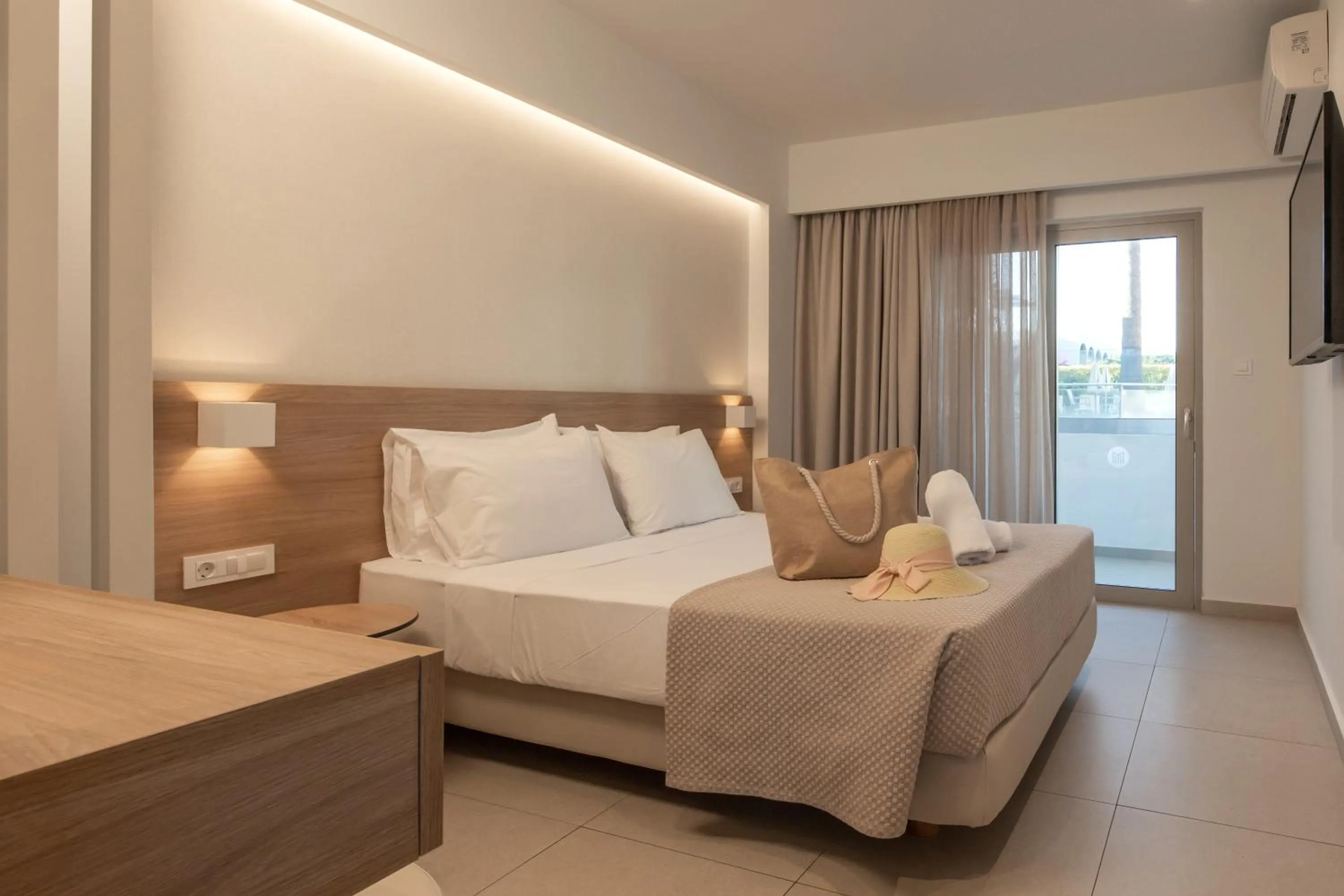 Bedroom, Bed in Mythos Suites Hotel