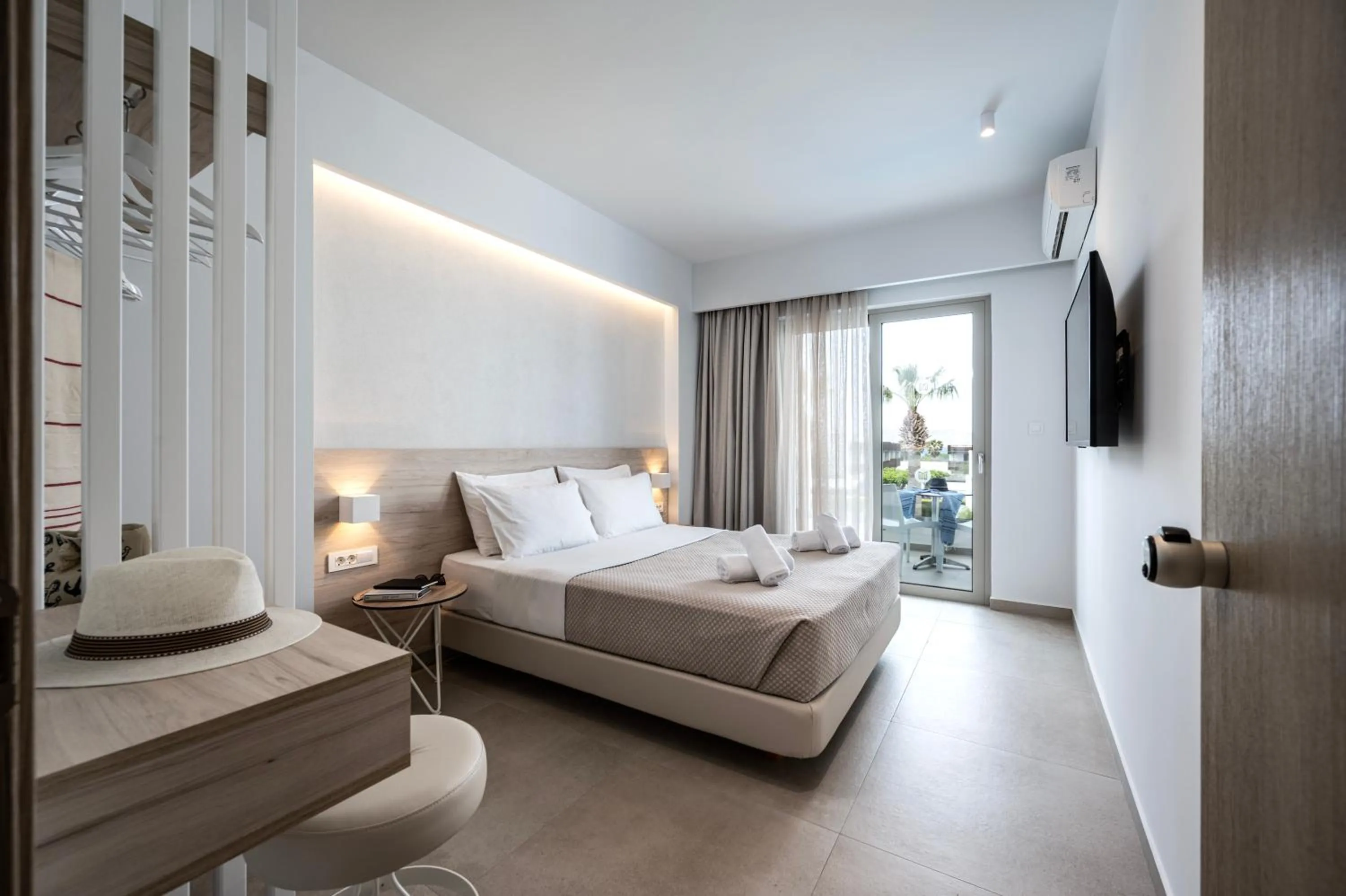 Bedroom, Bed in Mythos Suites Hotel