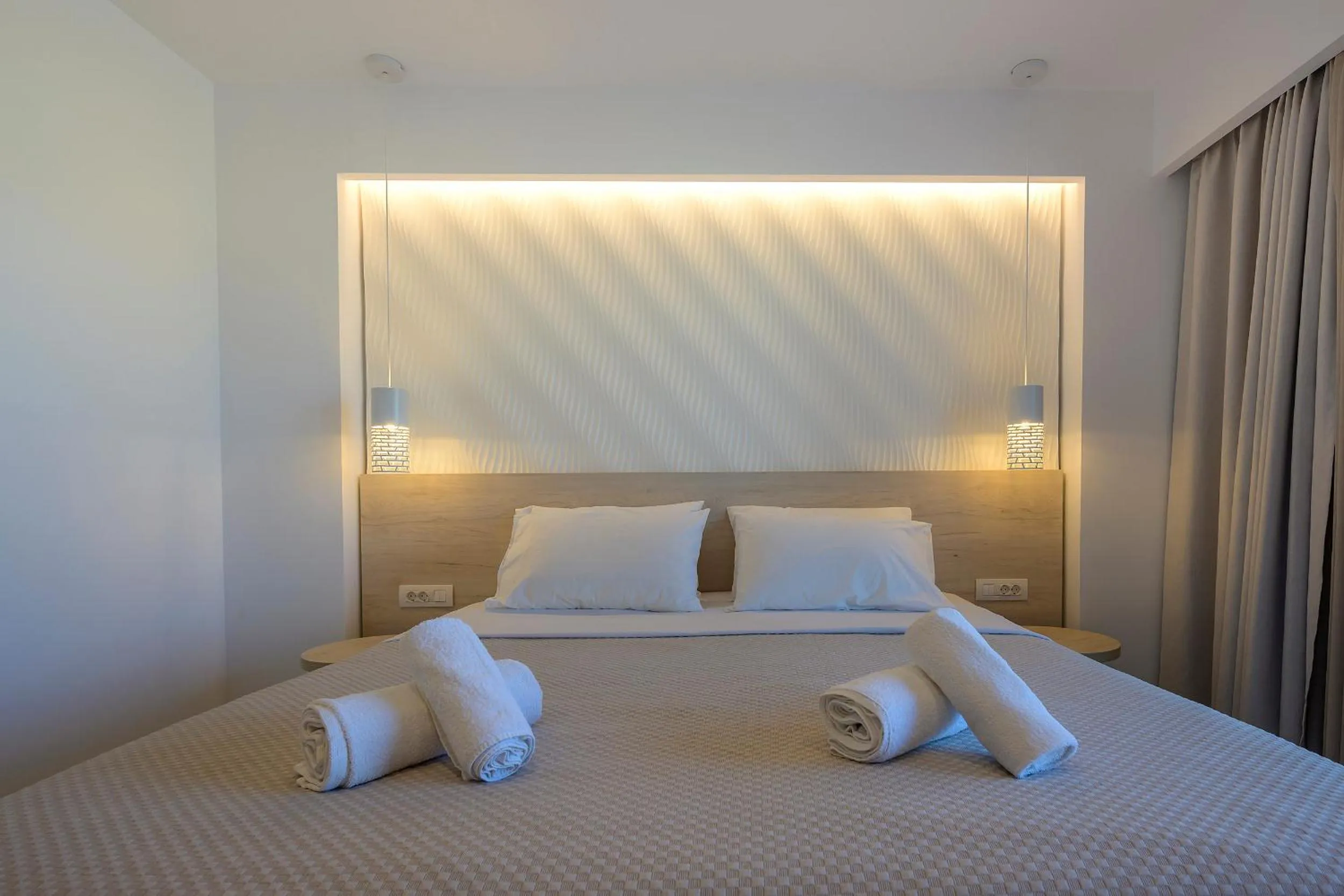 Bedroom, Bed in Mythos Suites Hotel