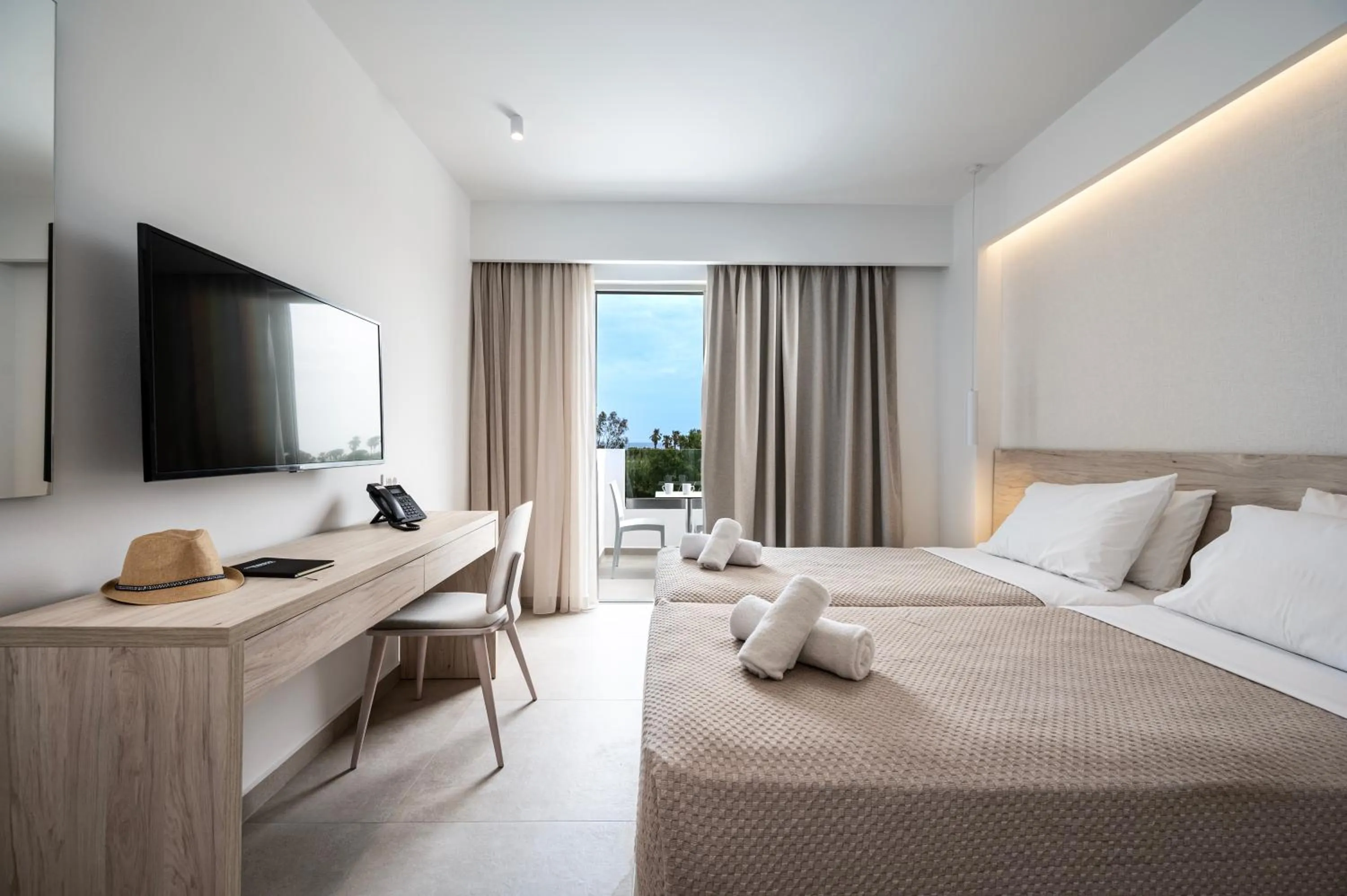 Photo of the whole room, Bed in Mythos Suites Hotel