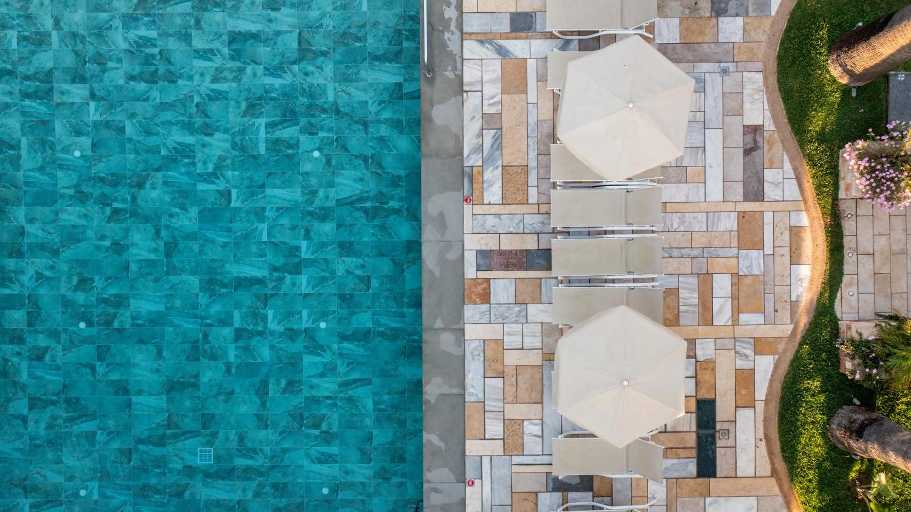 Swimming pool in Mythos Suites Hotel