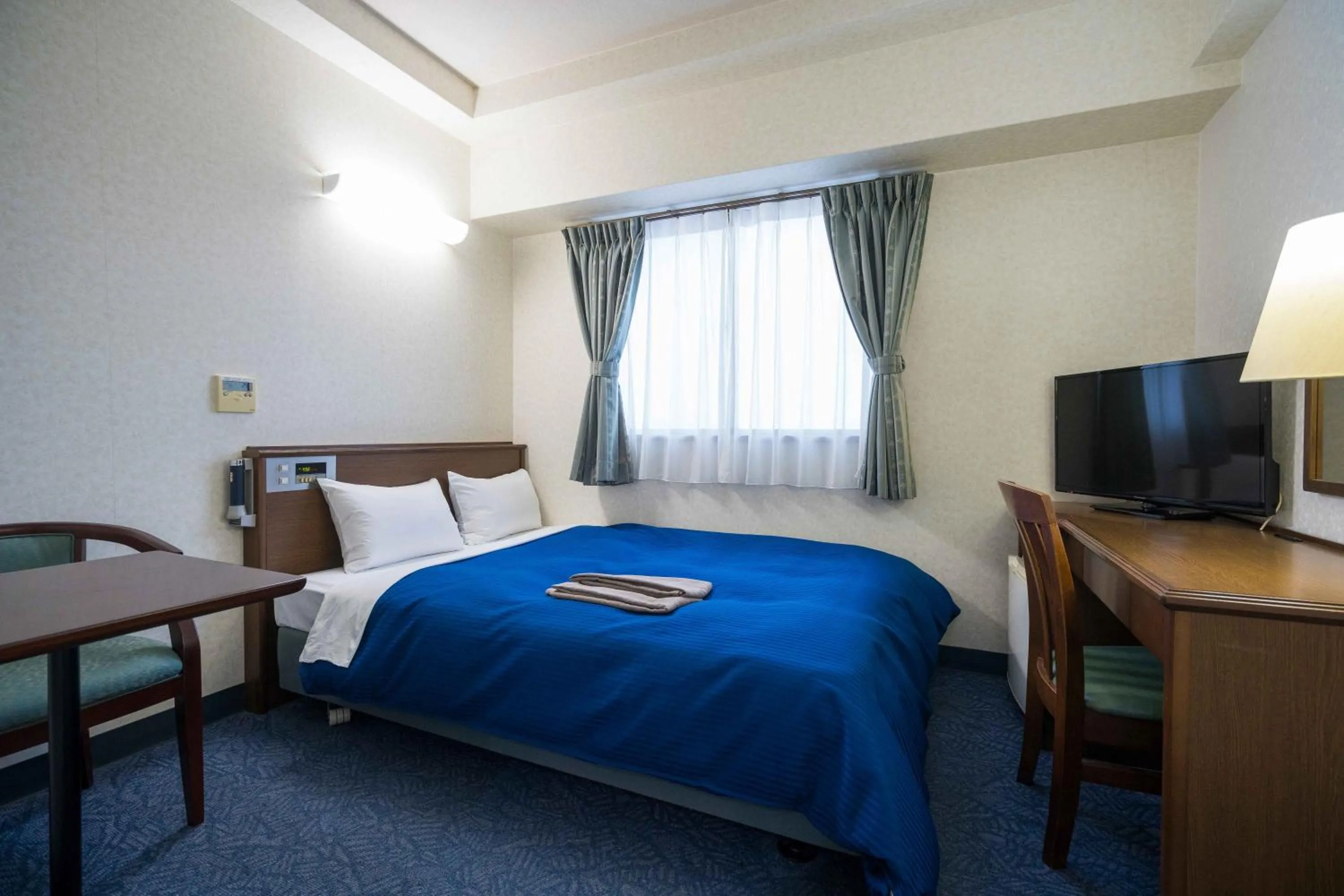 Bed in Suihoukaku Hotel