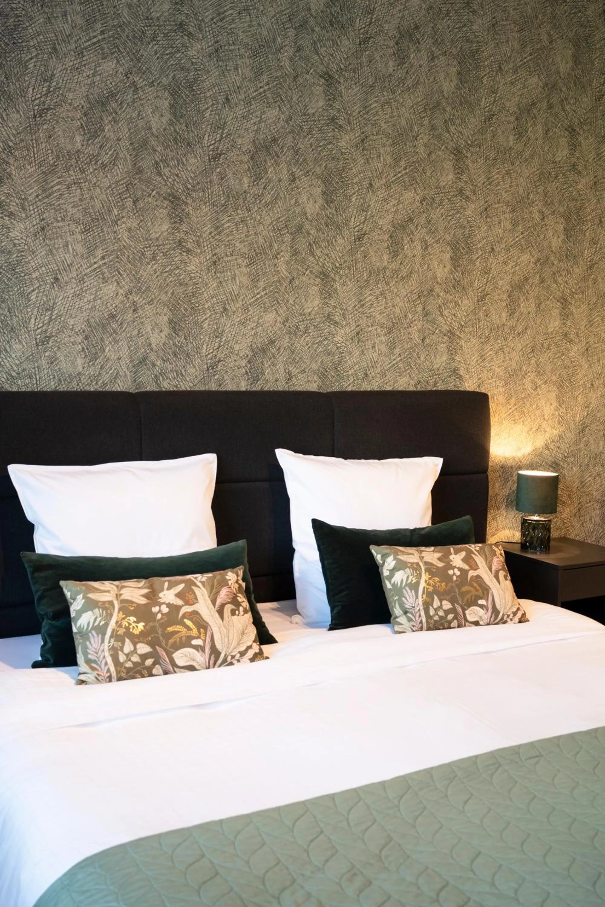 Bed in BnB De Koepoort