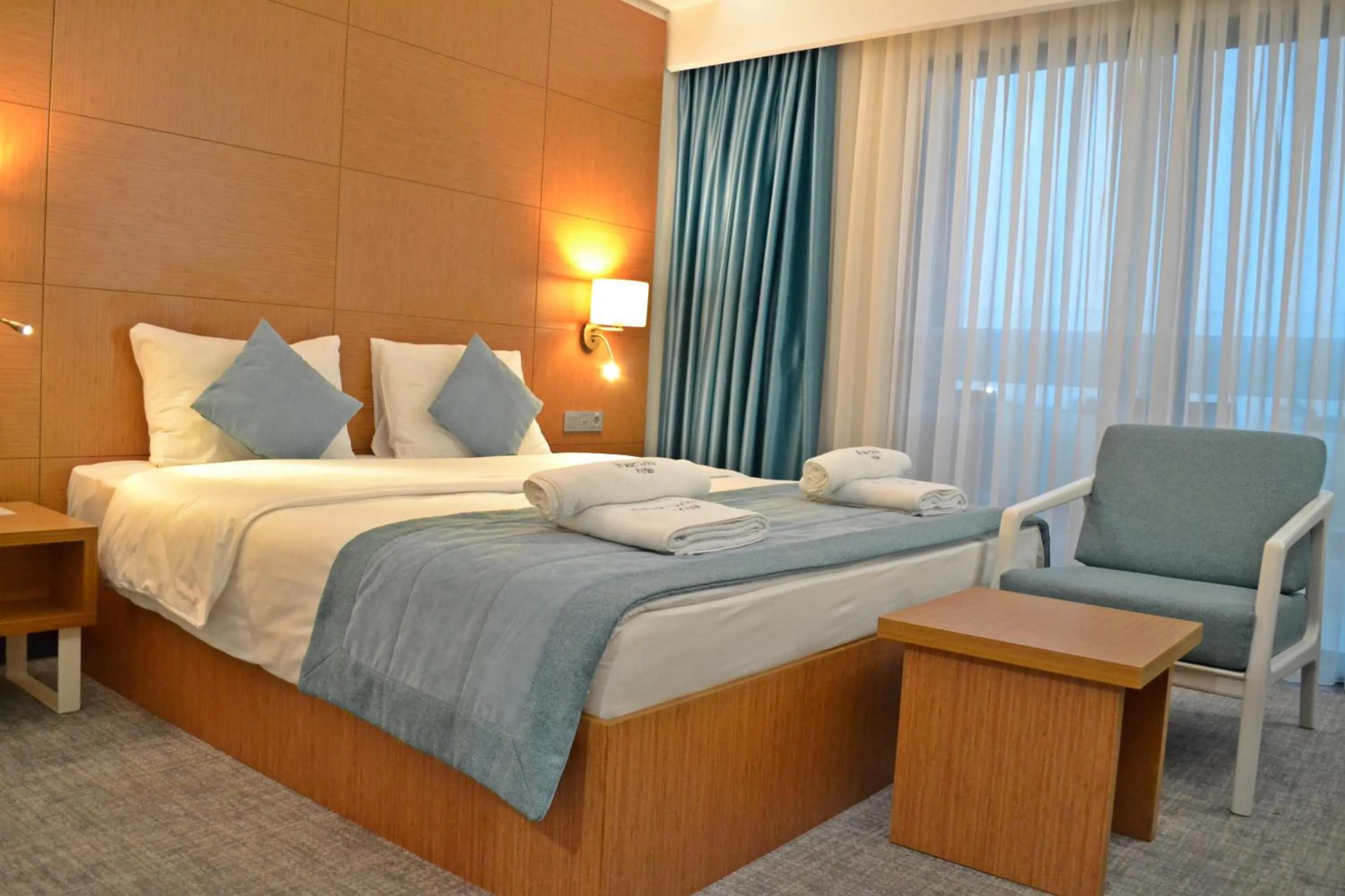 Bed in TEZMADRA HOTEL