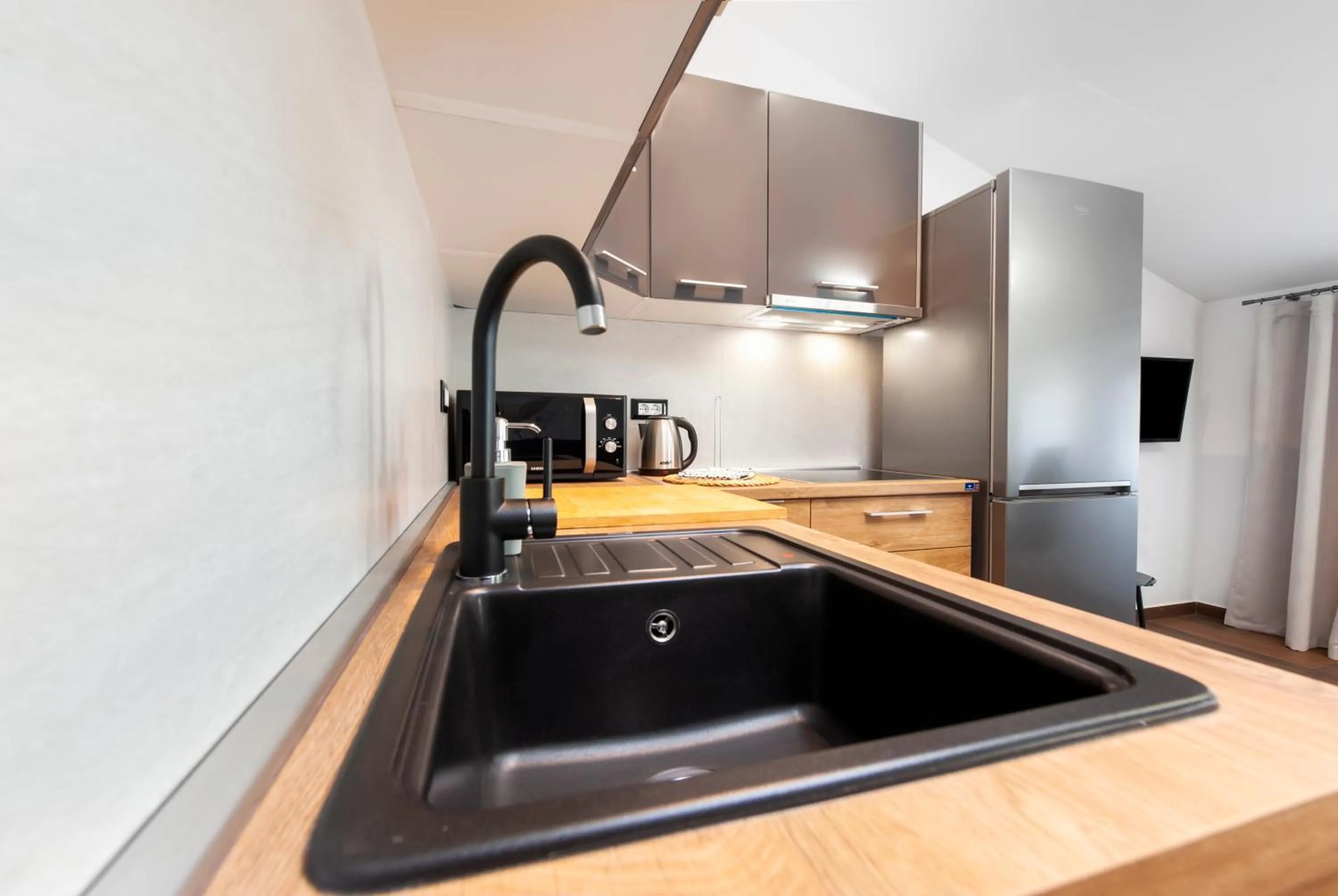 Kitchen or kitchenette in Apartments Sanja-New renovated