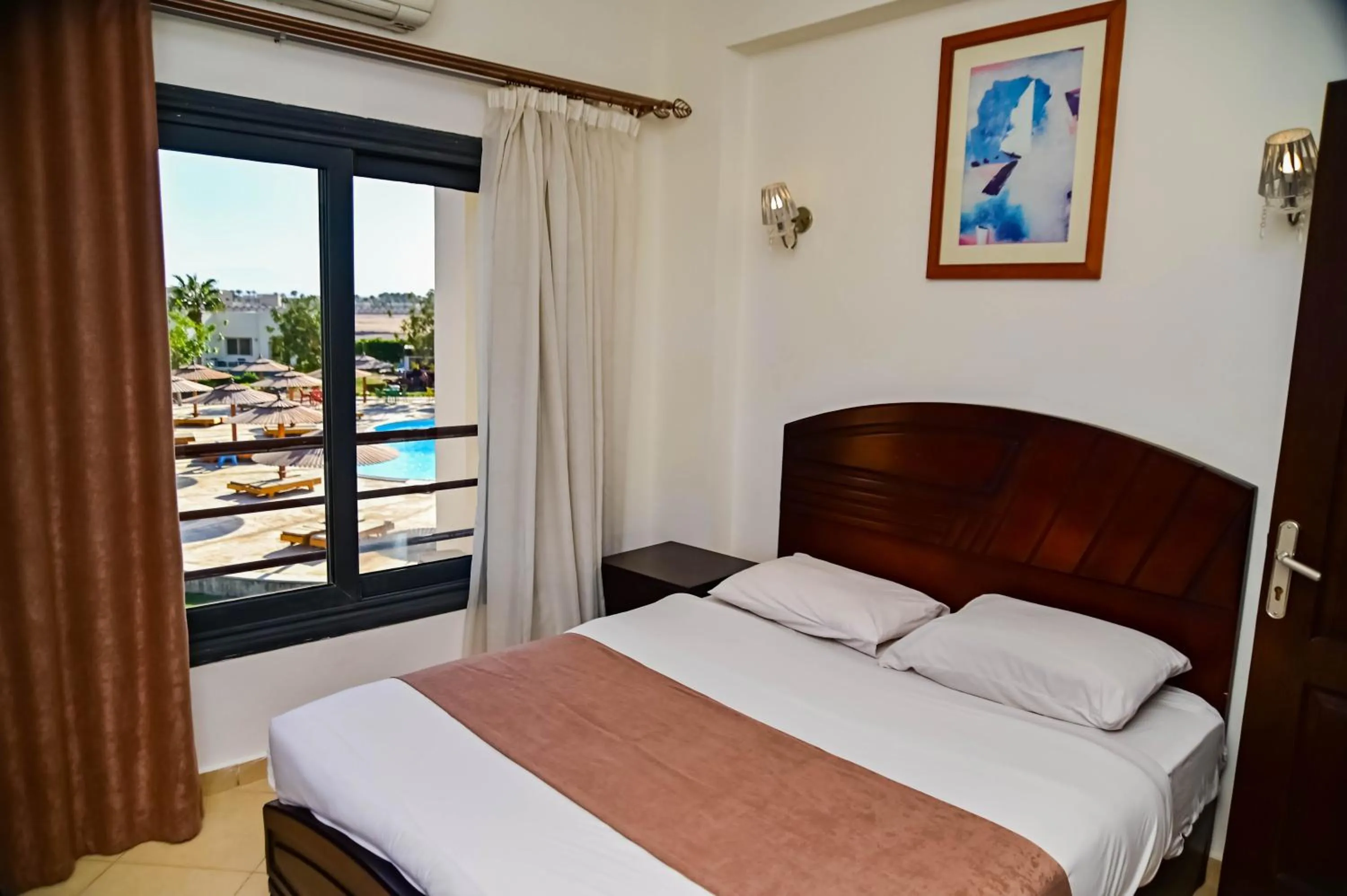 Bedroom, Bed in New Eagles Aqua Park Resort