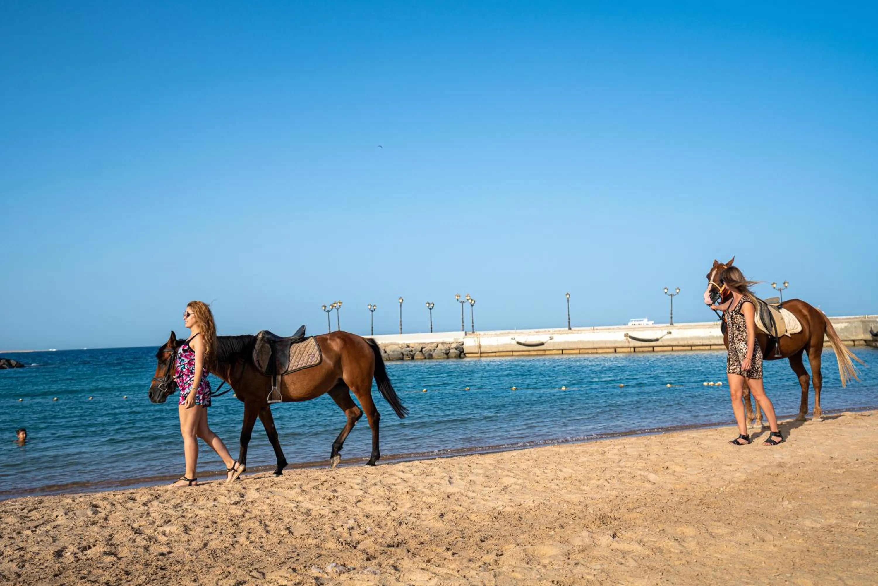 People in New Eagles Aqua Park Resort