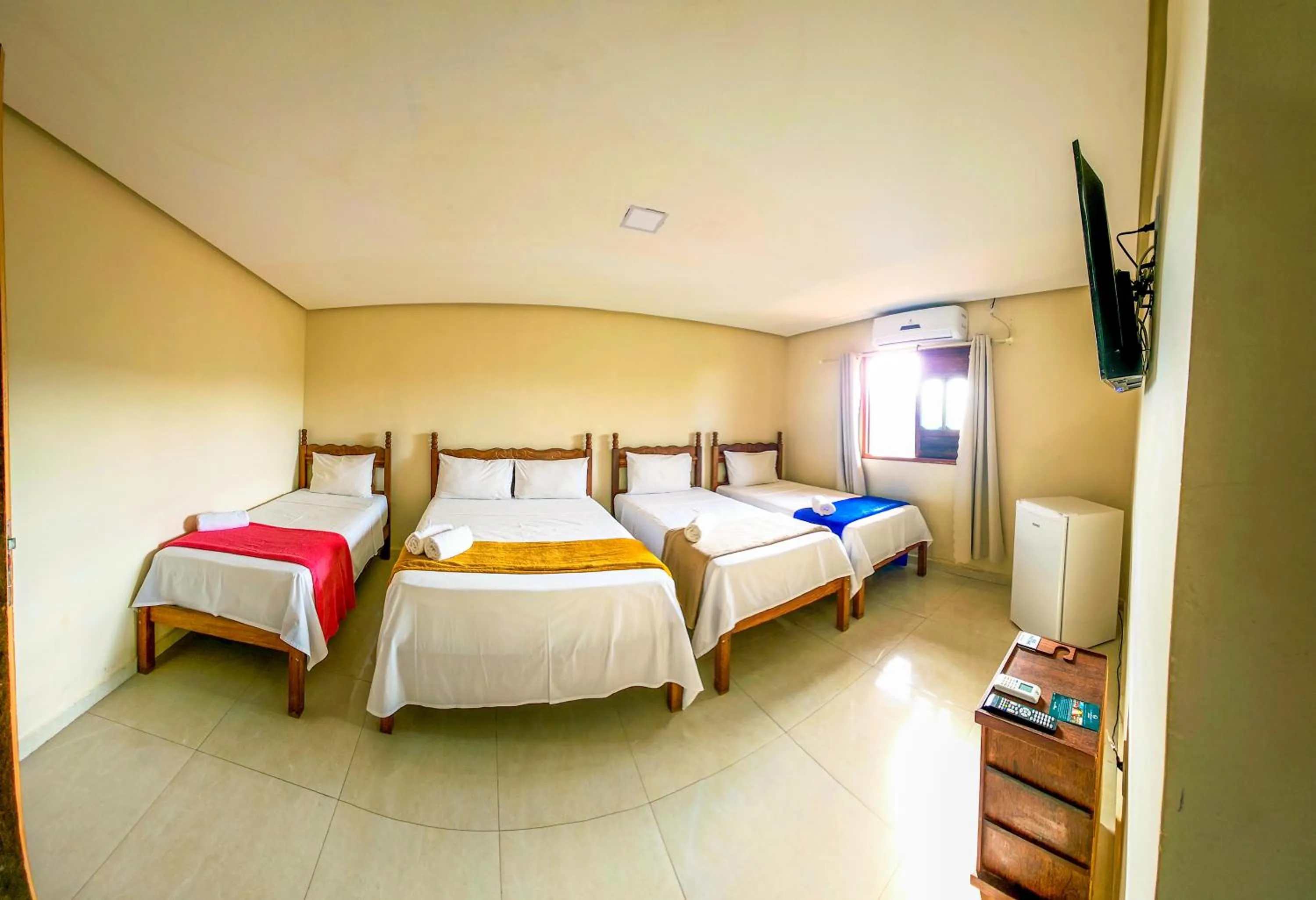 Bed in Vila Sancar Pousada