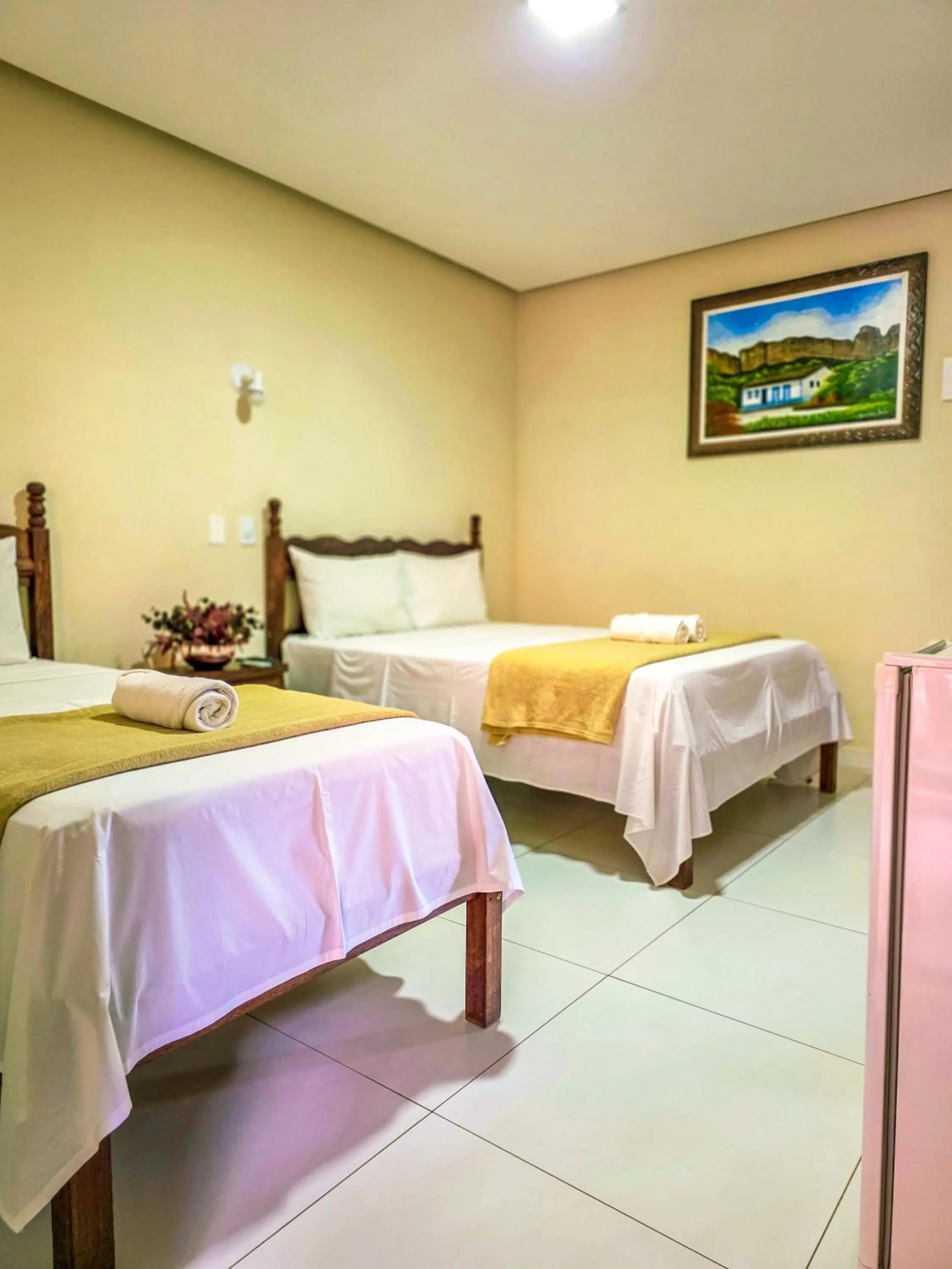 Bed in Vila Sancar Pousada