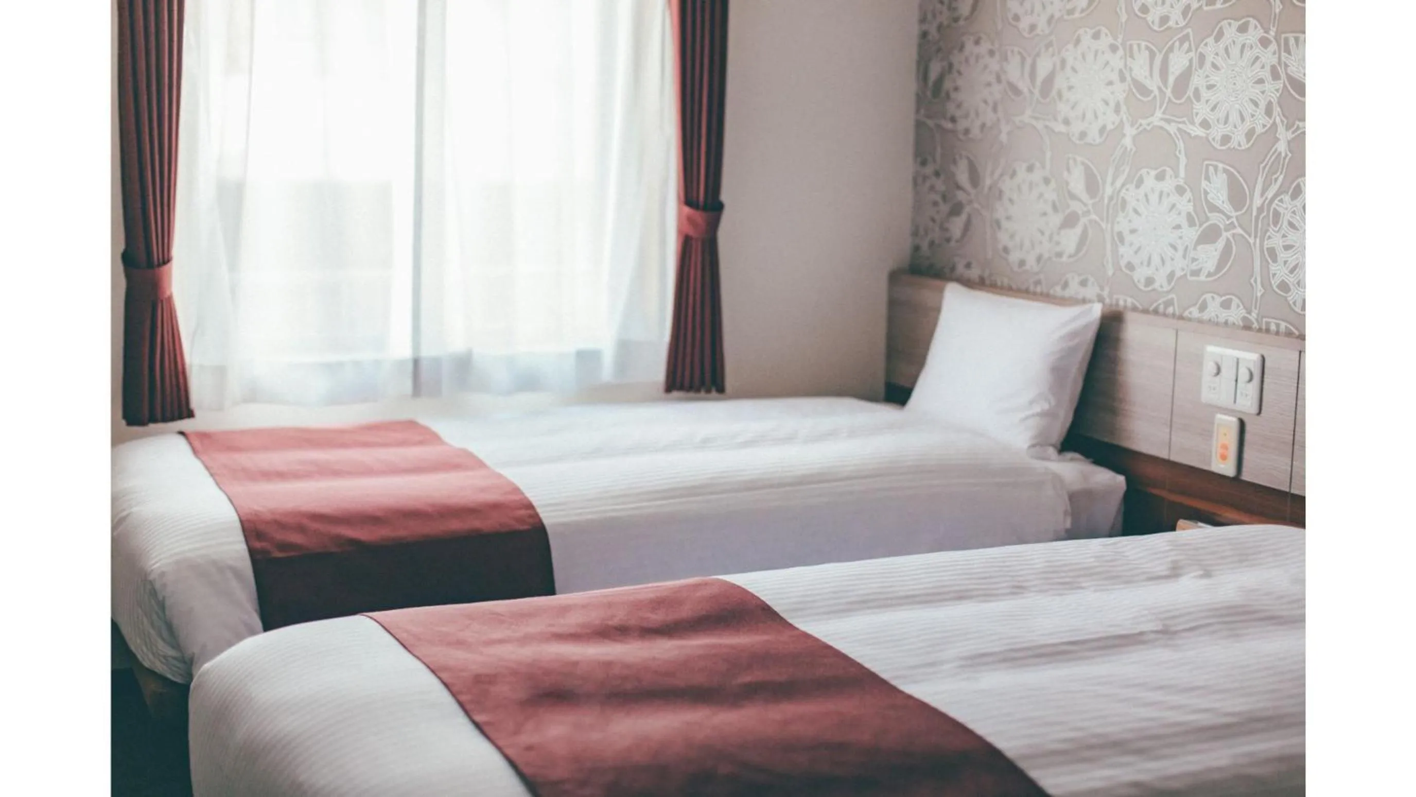 Bed in Kuretake Inn Premium Shizuoka Annex