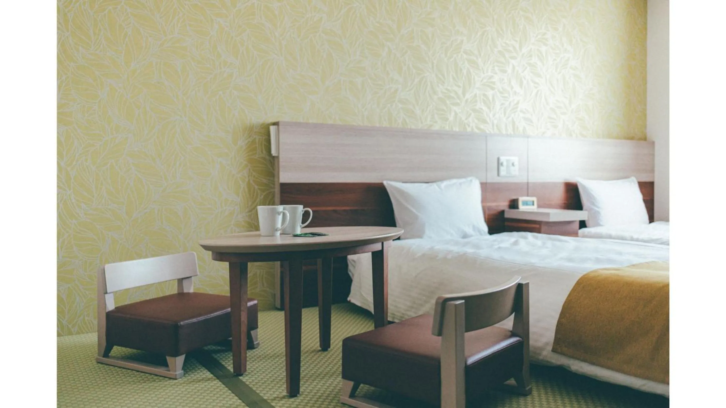 Bed in Kuretake Inn Premium Shizuoka Annex