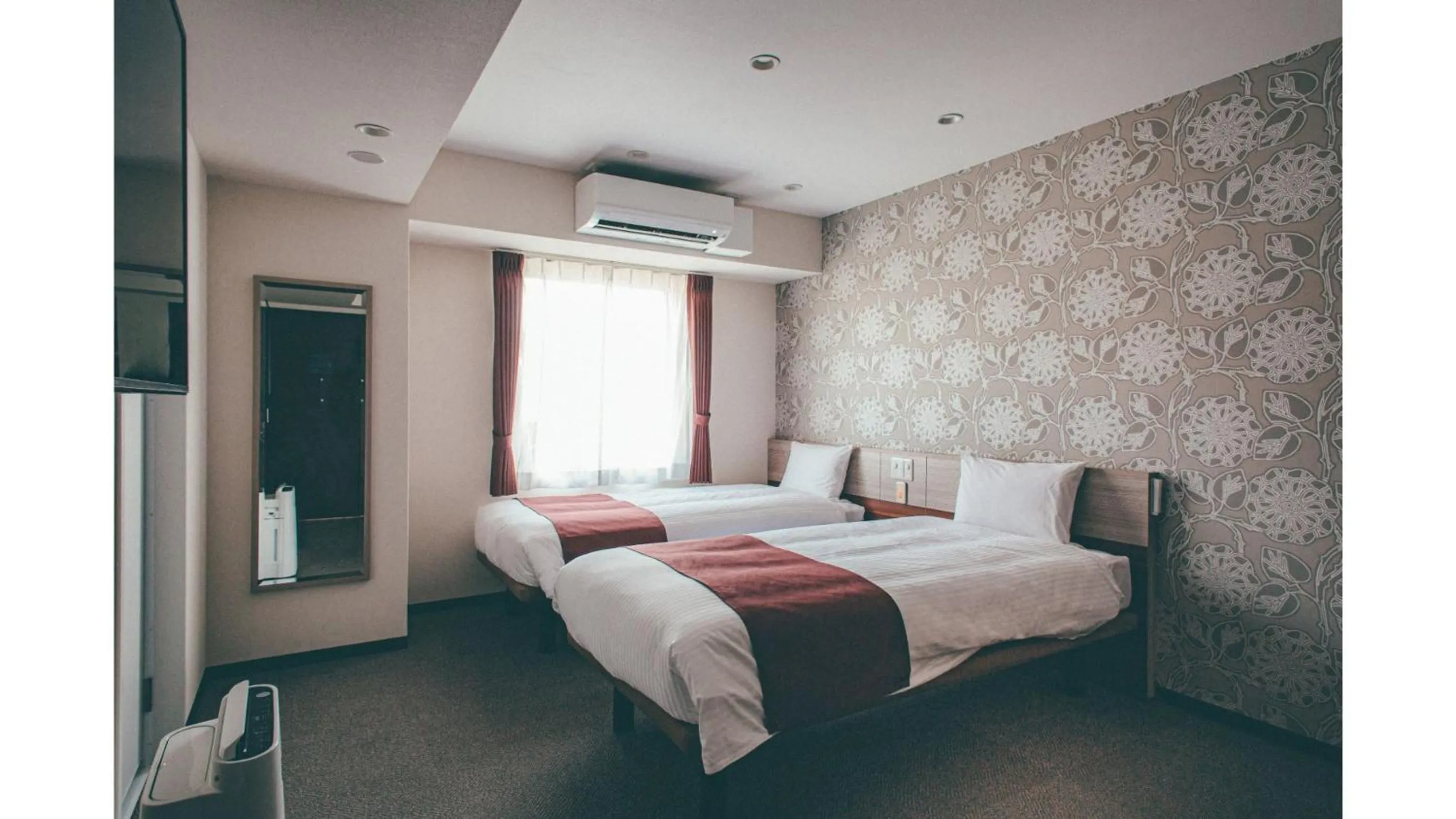 Bed in Kuretake Inn Premium Shizuoka Annex