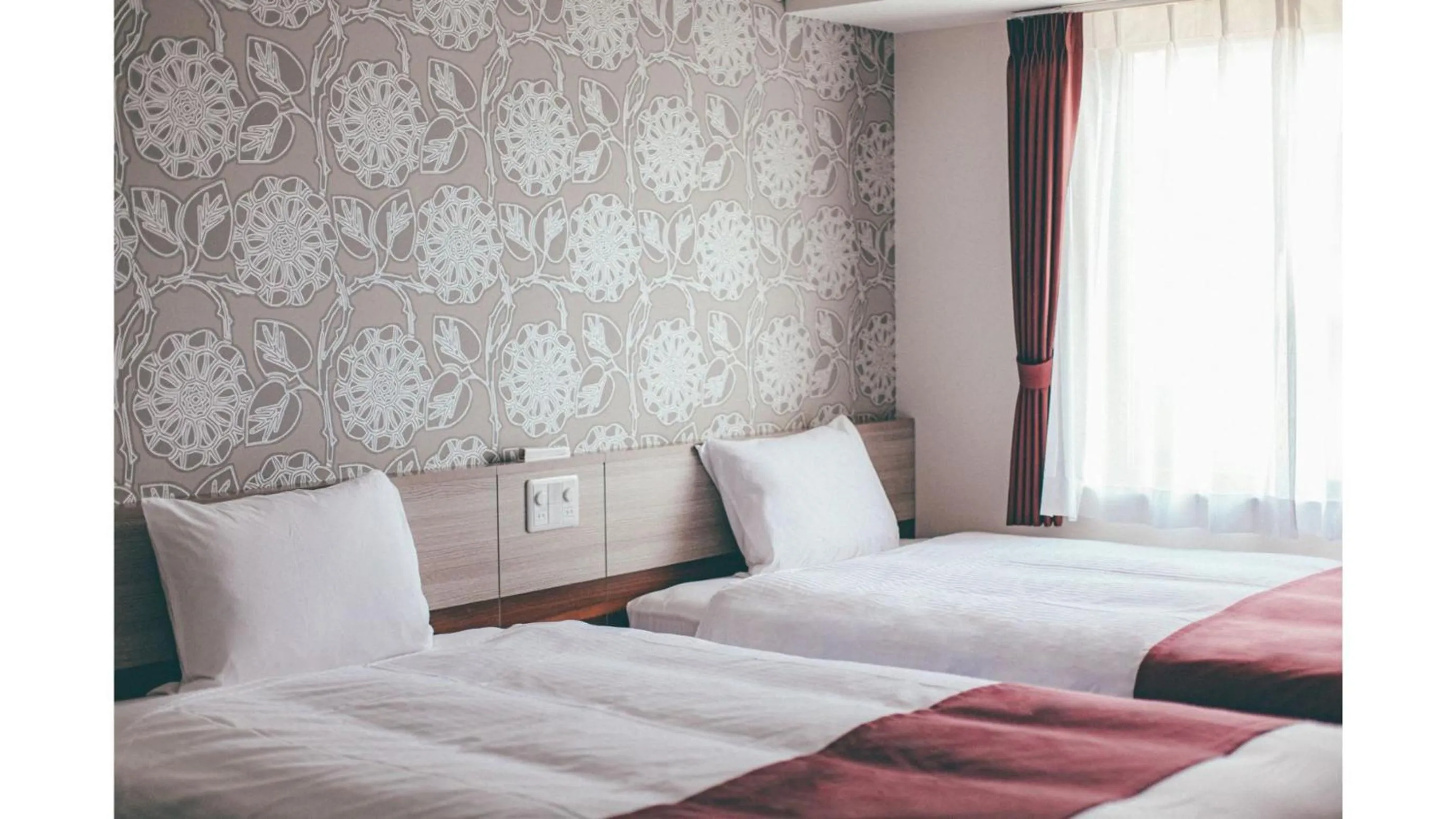 Bed in Kuretake Inn Premium Shizuoka Annex