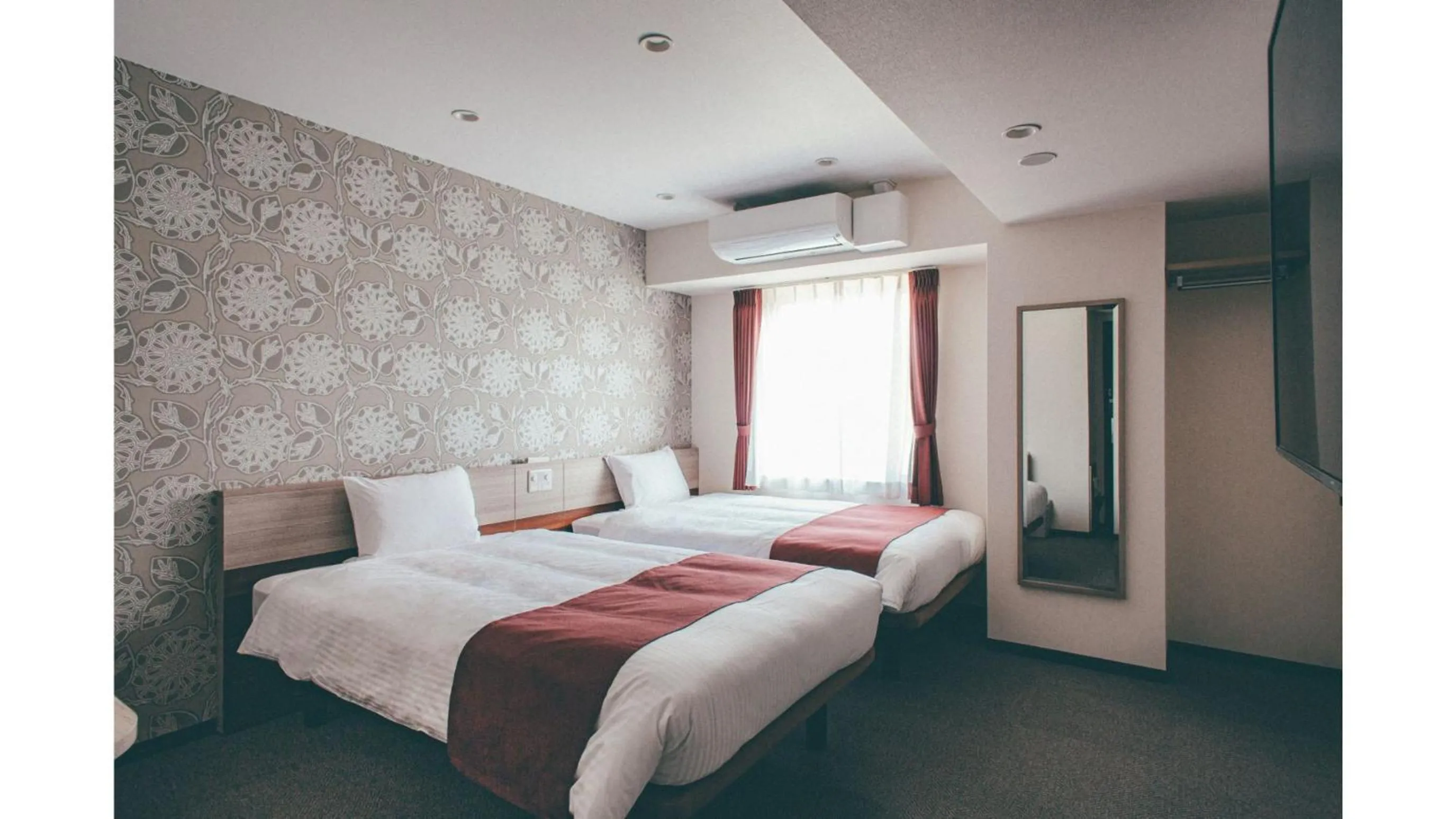 Bed in Kuretake Inn Premium Shizuoka Annex