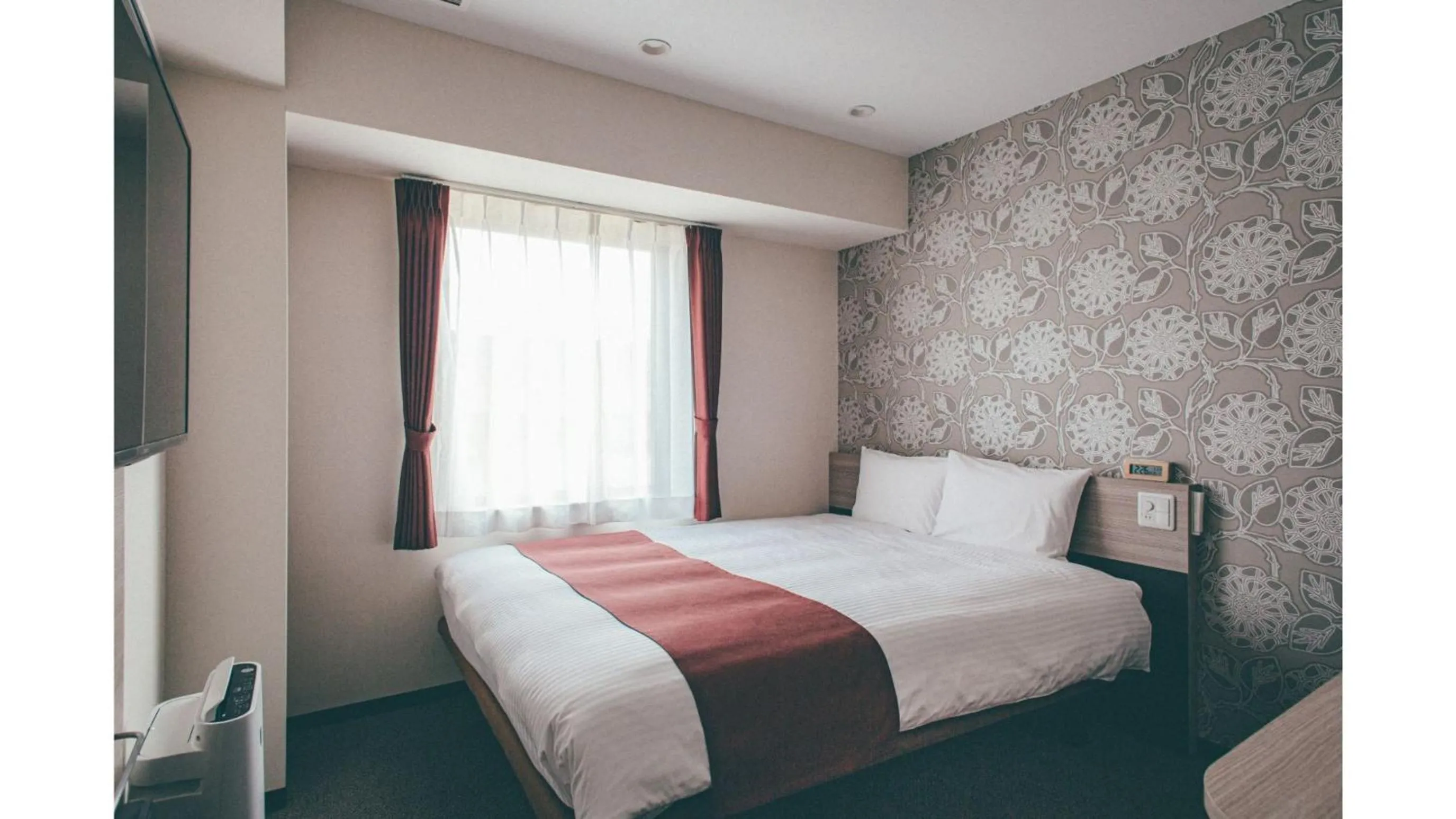 Bed in Kuretake Inn Premium Shizuoka Annex