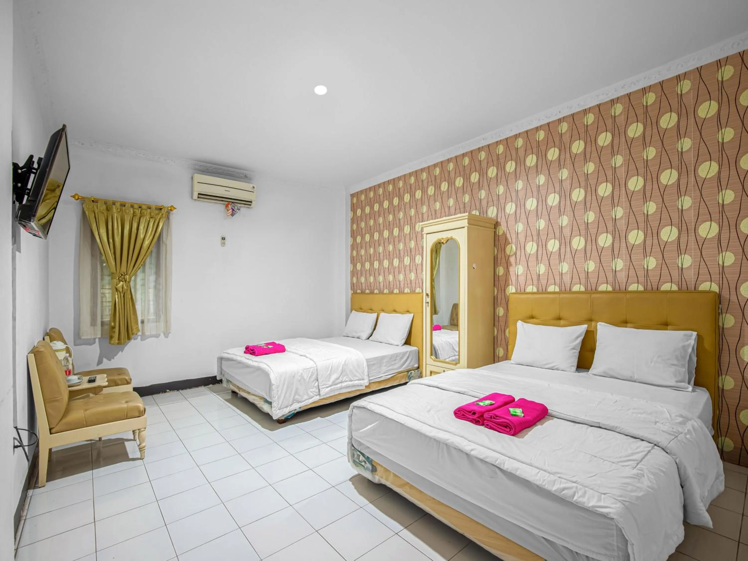 Bed in Hotel Cempaka Sari