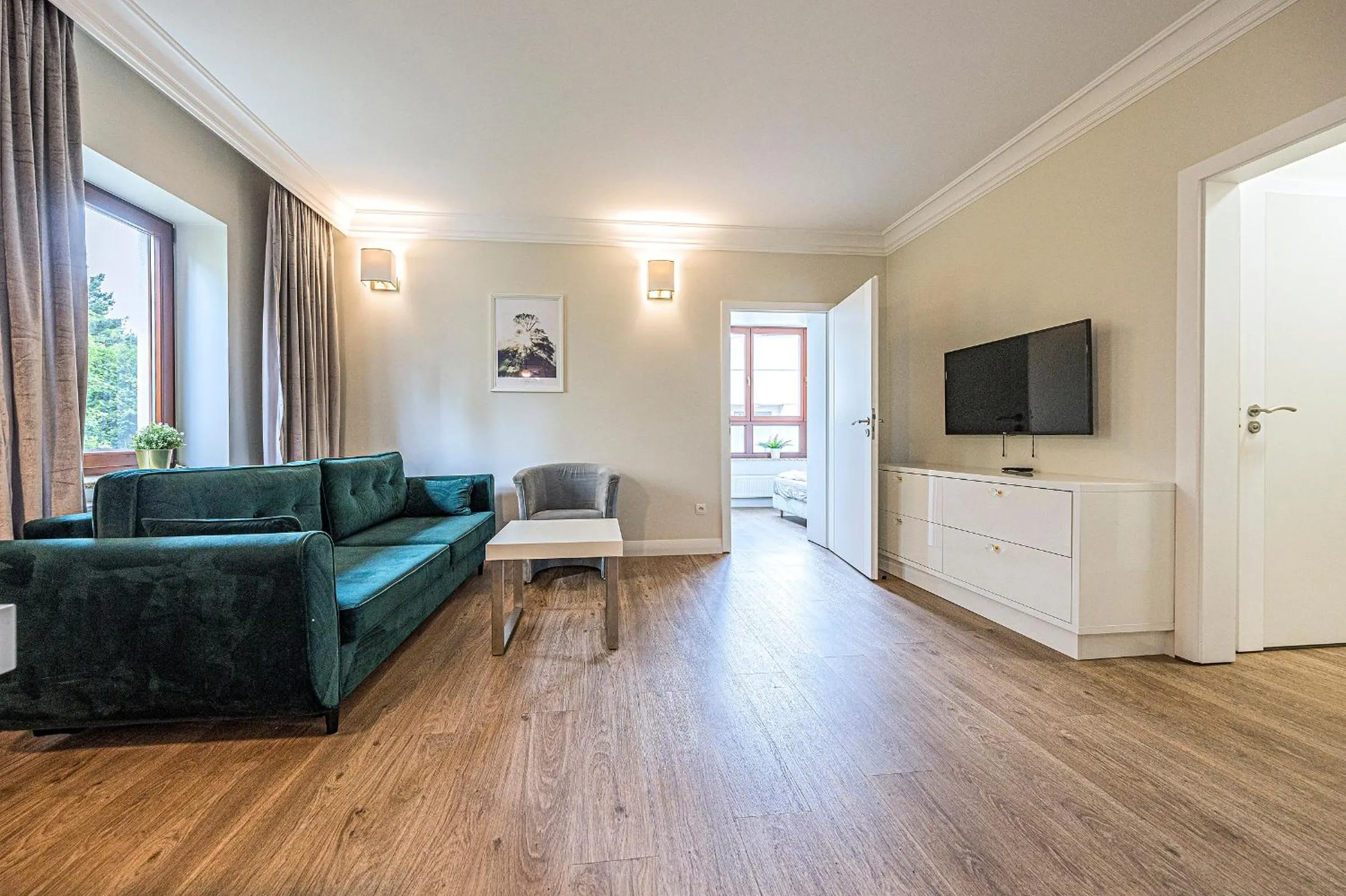 Communal lounge/ TV room in Apartamenty Martini