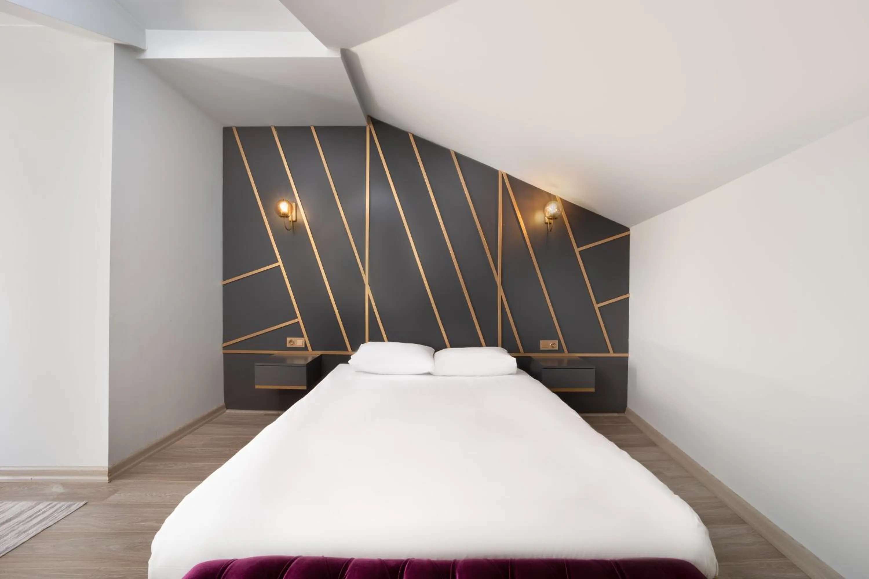 Bed in Family Time Suites Hotel