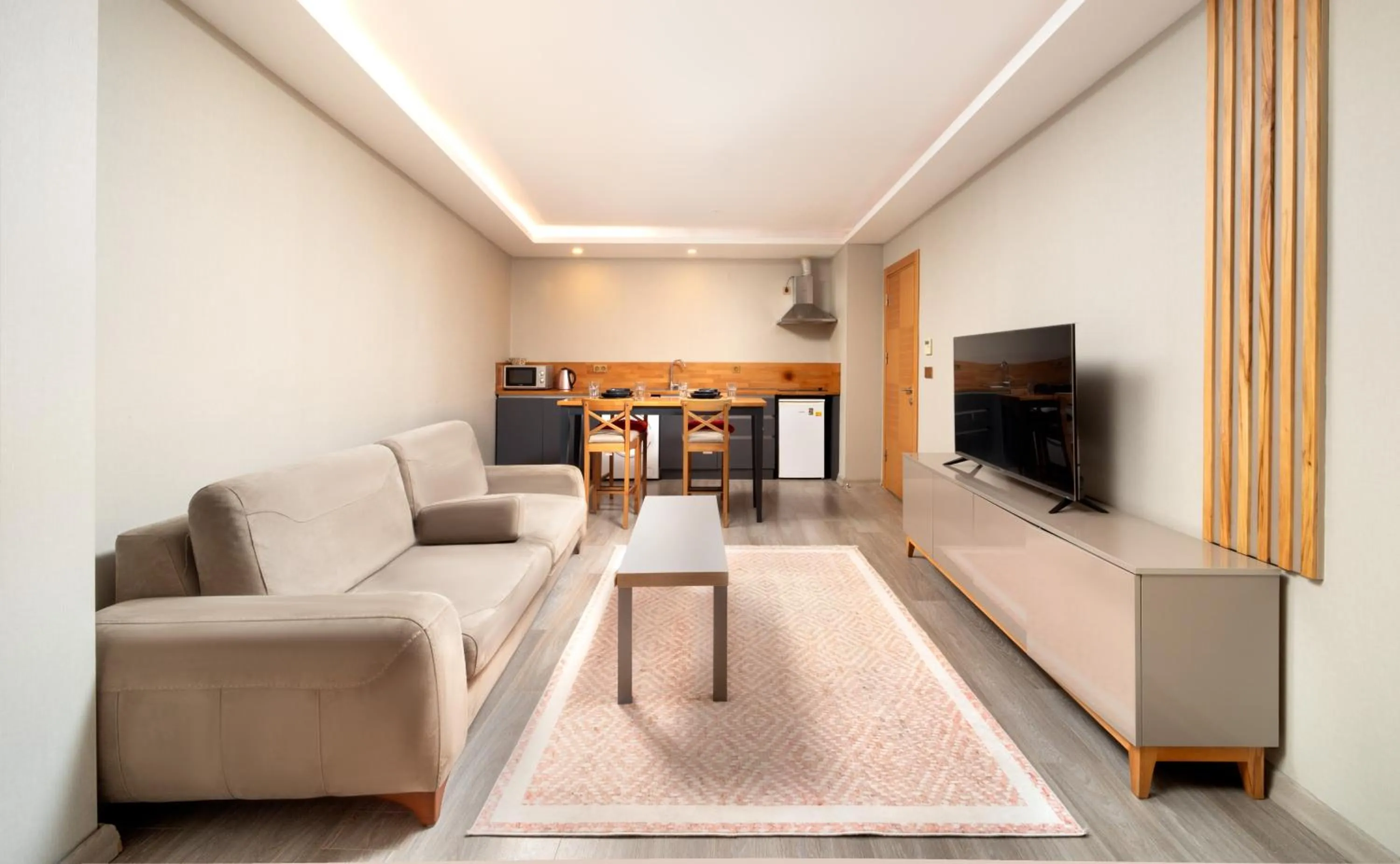 TV and multimedia in Family Time Suites Hotel