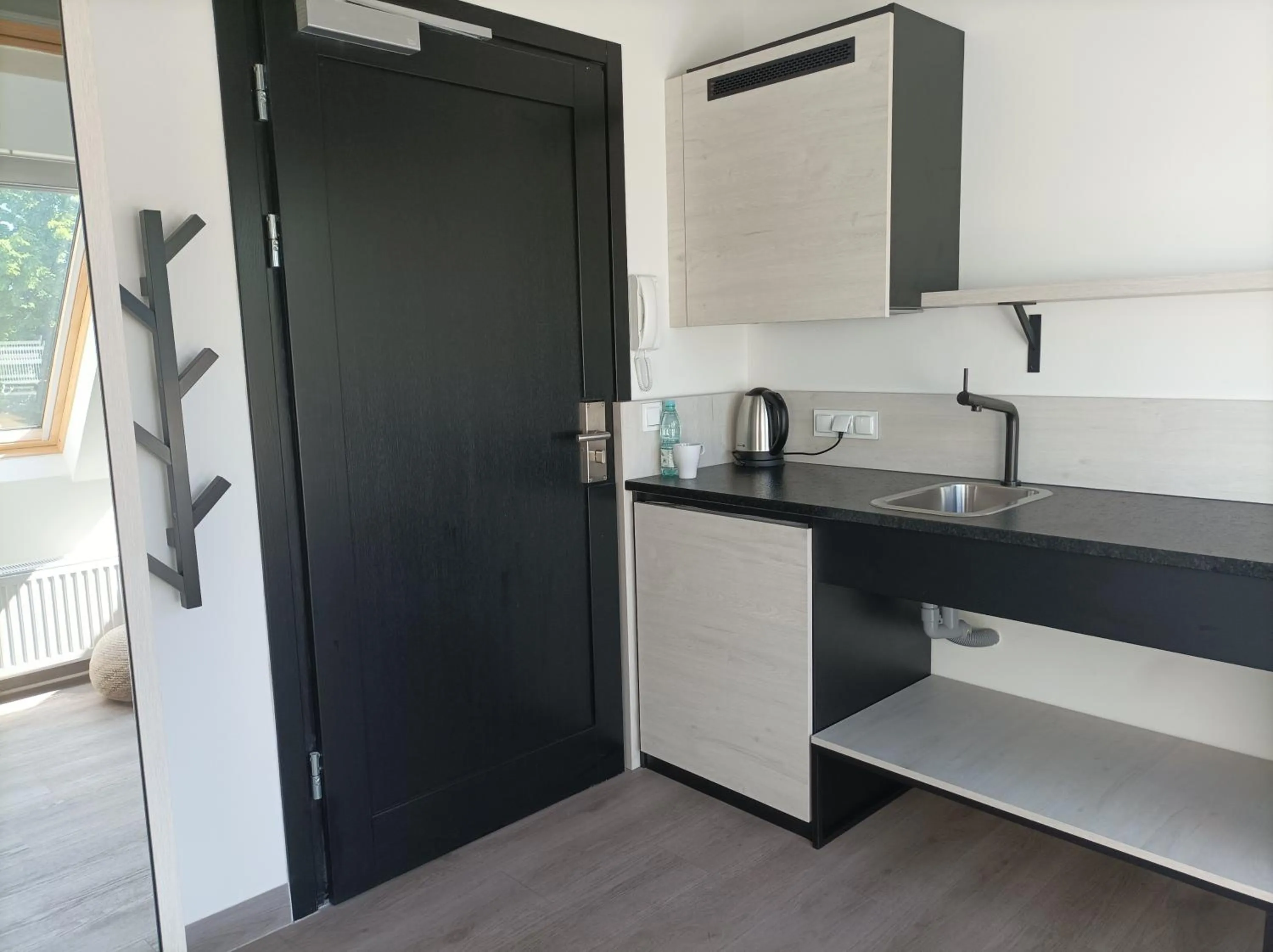 Kitchen or kitchenette in Lofty Kampus Garnizon