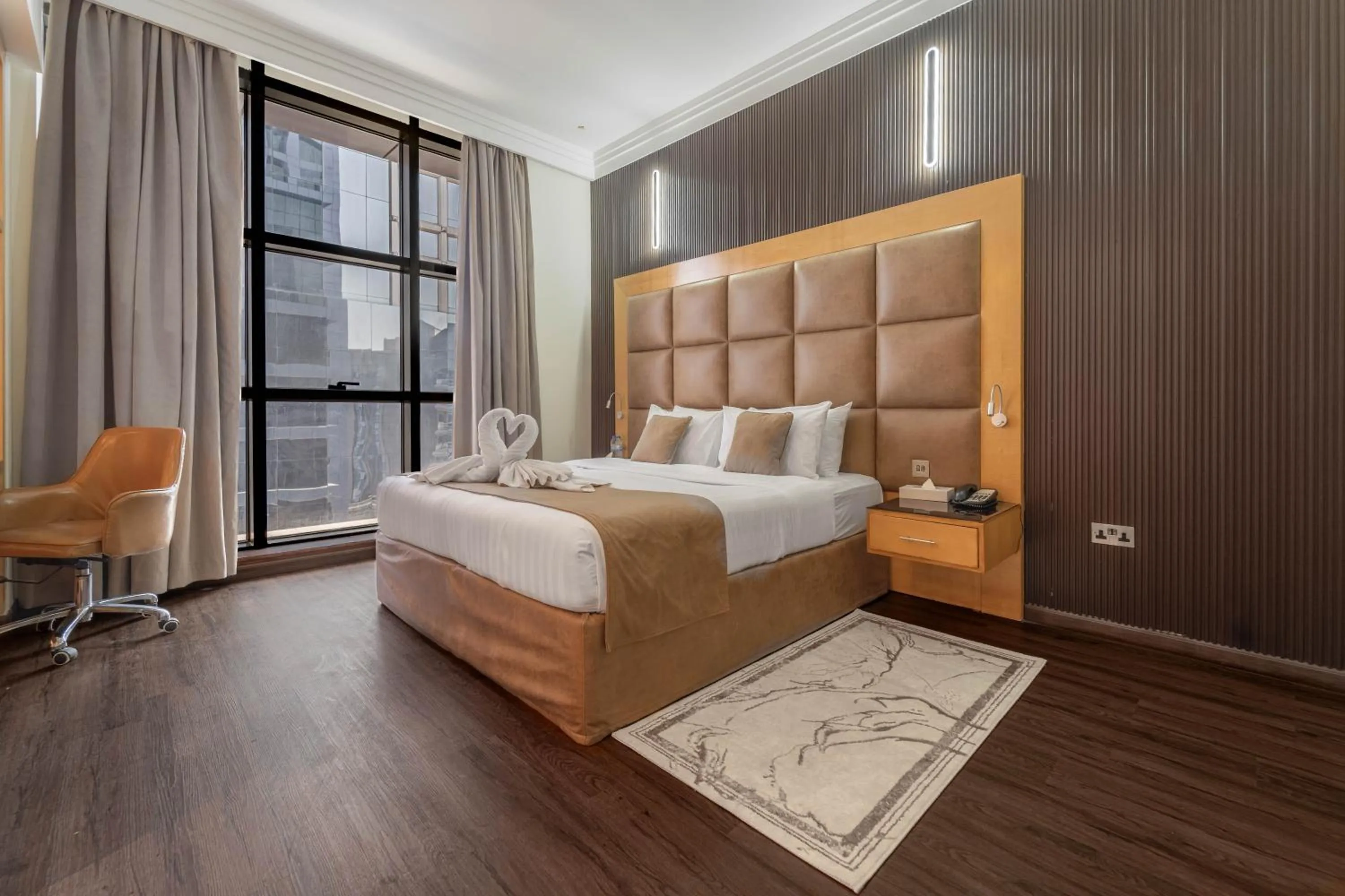 Bed in The Leela Hotel