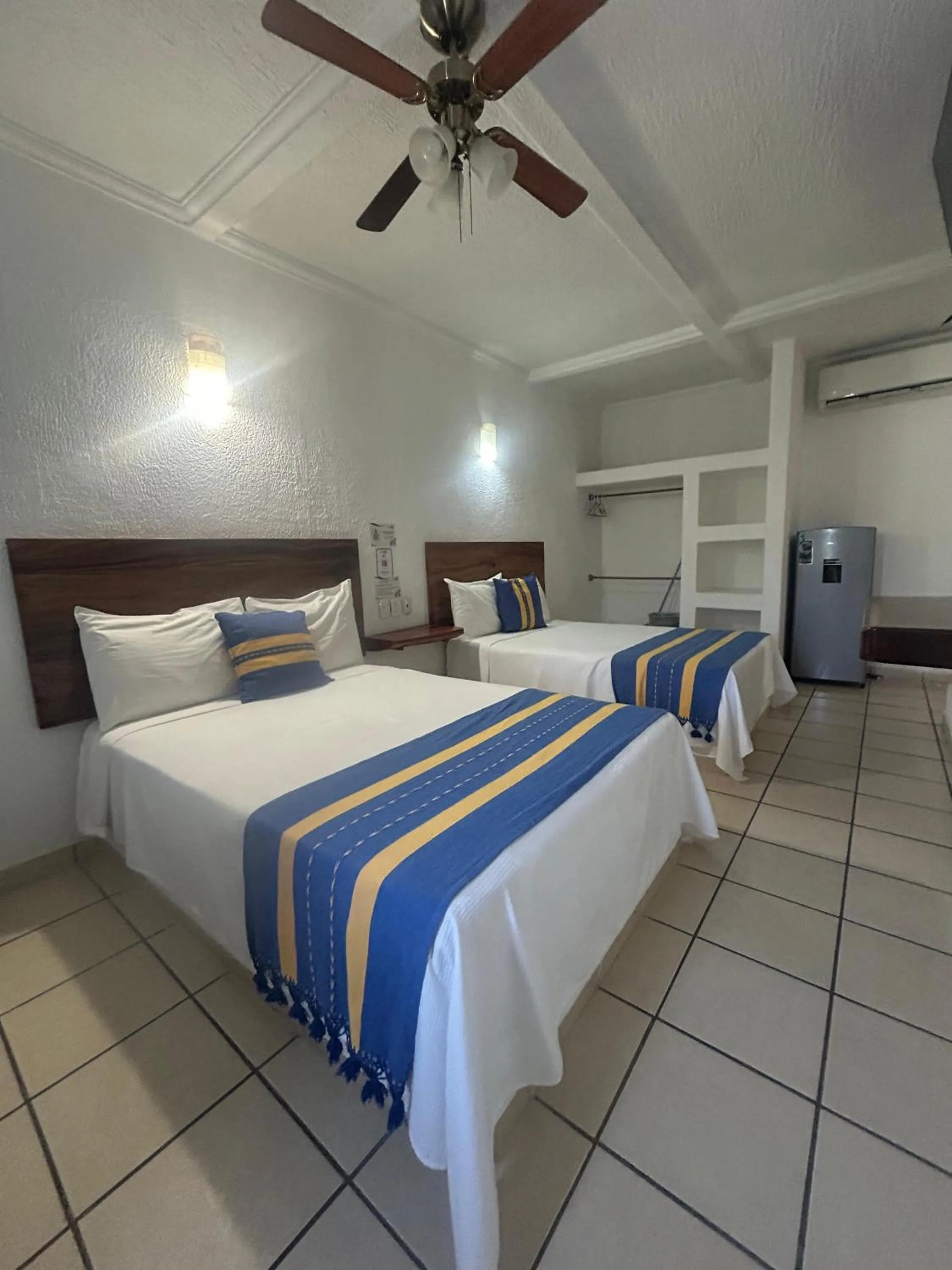 Bedroom, Bed in Hotel Careyes Puerto Escondido