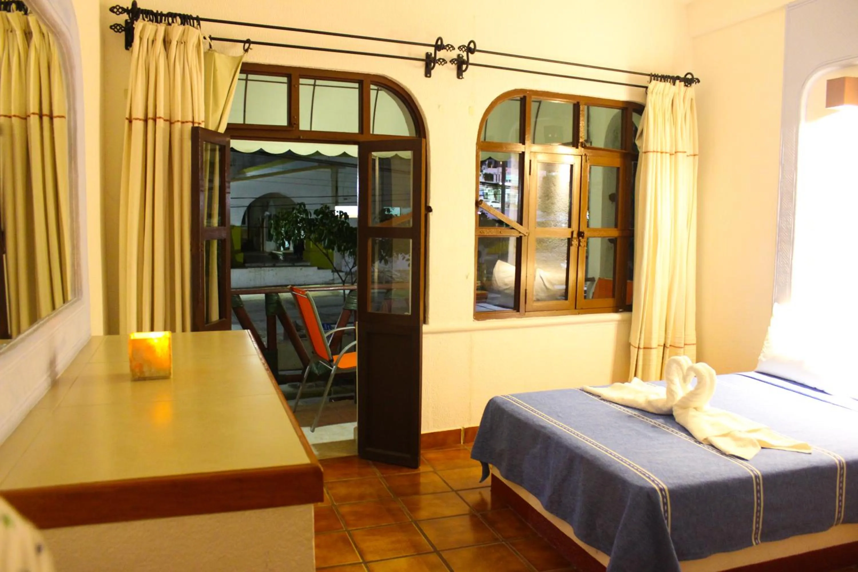 Balcony/Terrace, Bed in Hotel Careyes Puerto Escondido