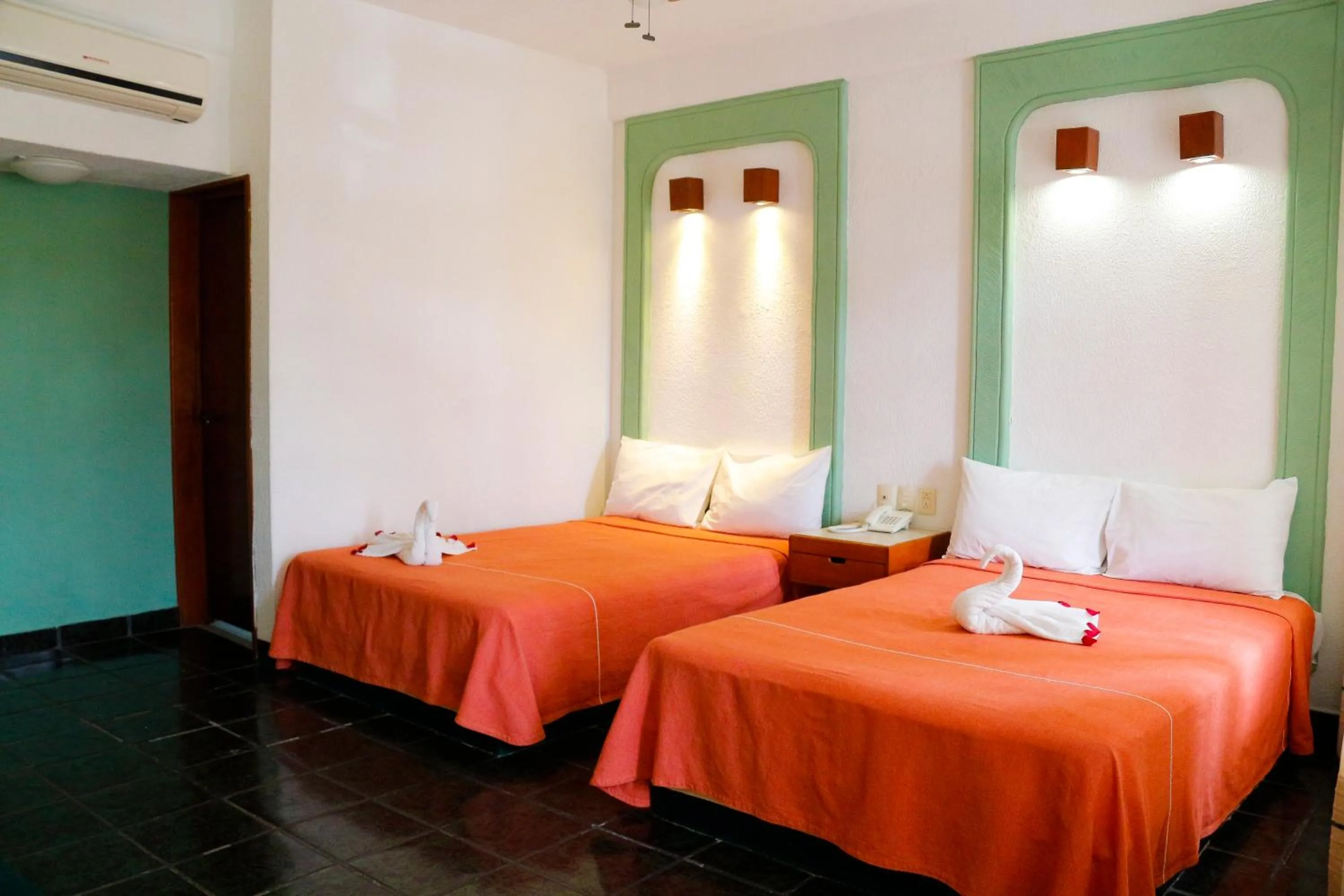 Bed in Hotel Careyes Puerto Escondido