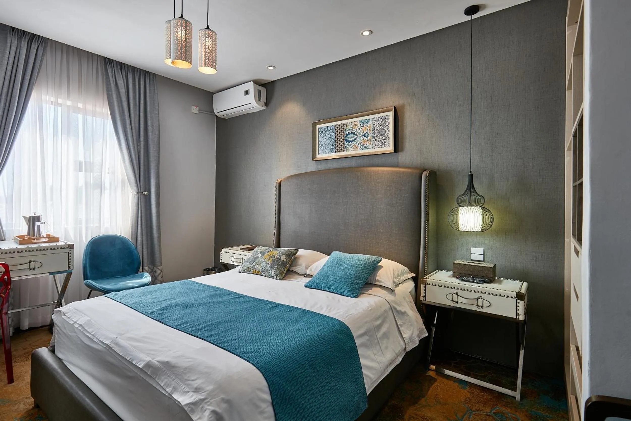 Bed in Madamz Bed & Breakfast