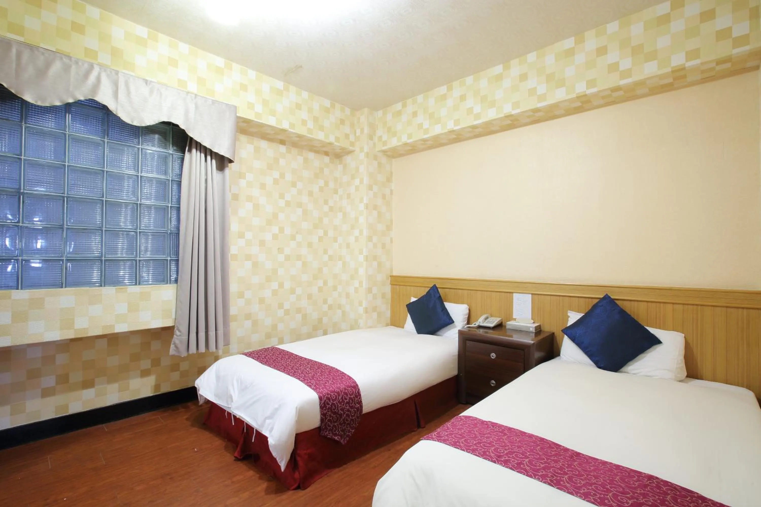 Bed in Chiayi Crown Hotel