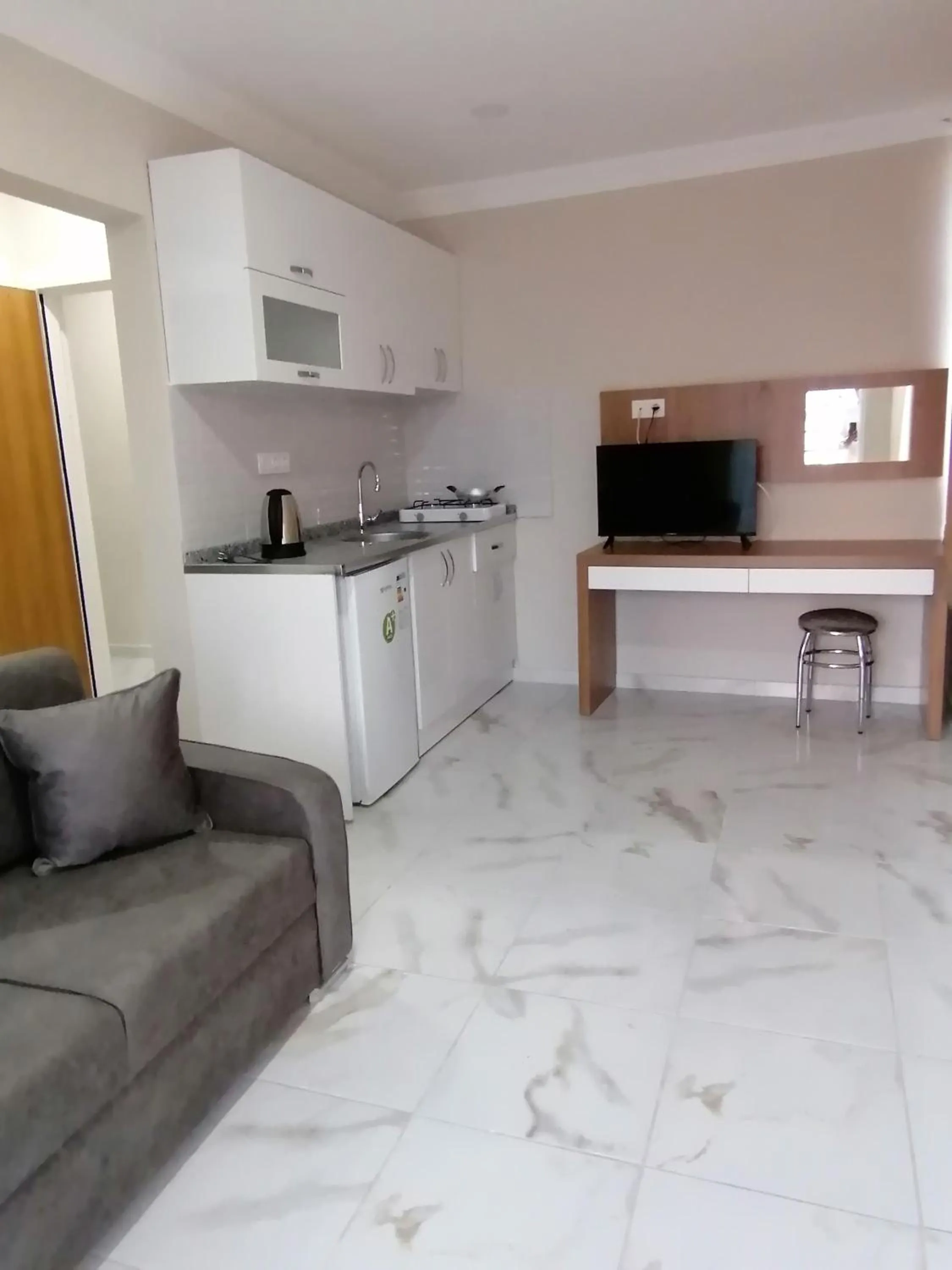 Kitchen or kitchenette in REGA OTEL