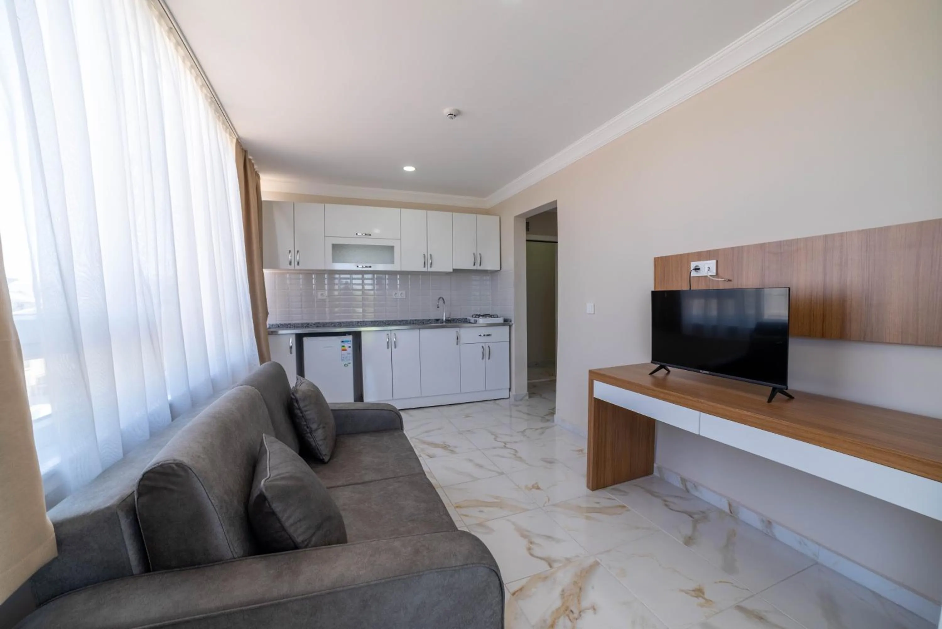 Communal lounge/ TV room in REGA OTEL