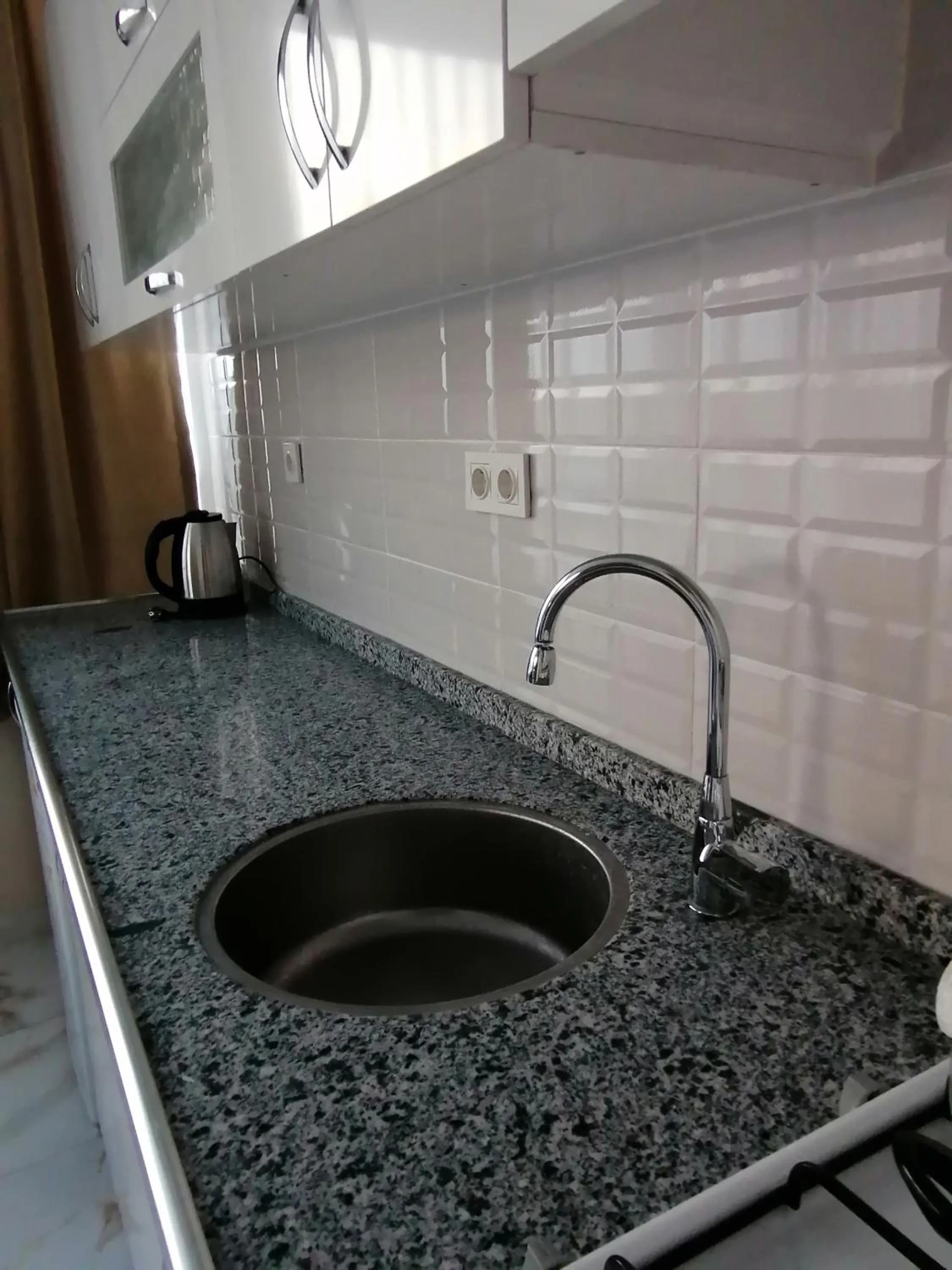 Kitchen or kitchenette in REGA OTEL