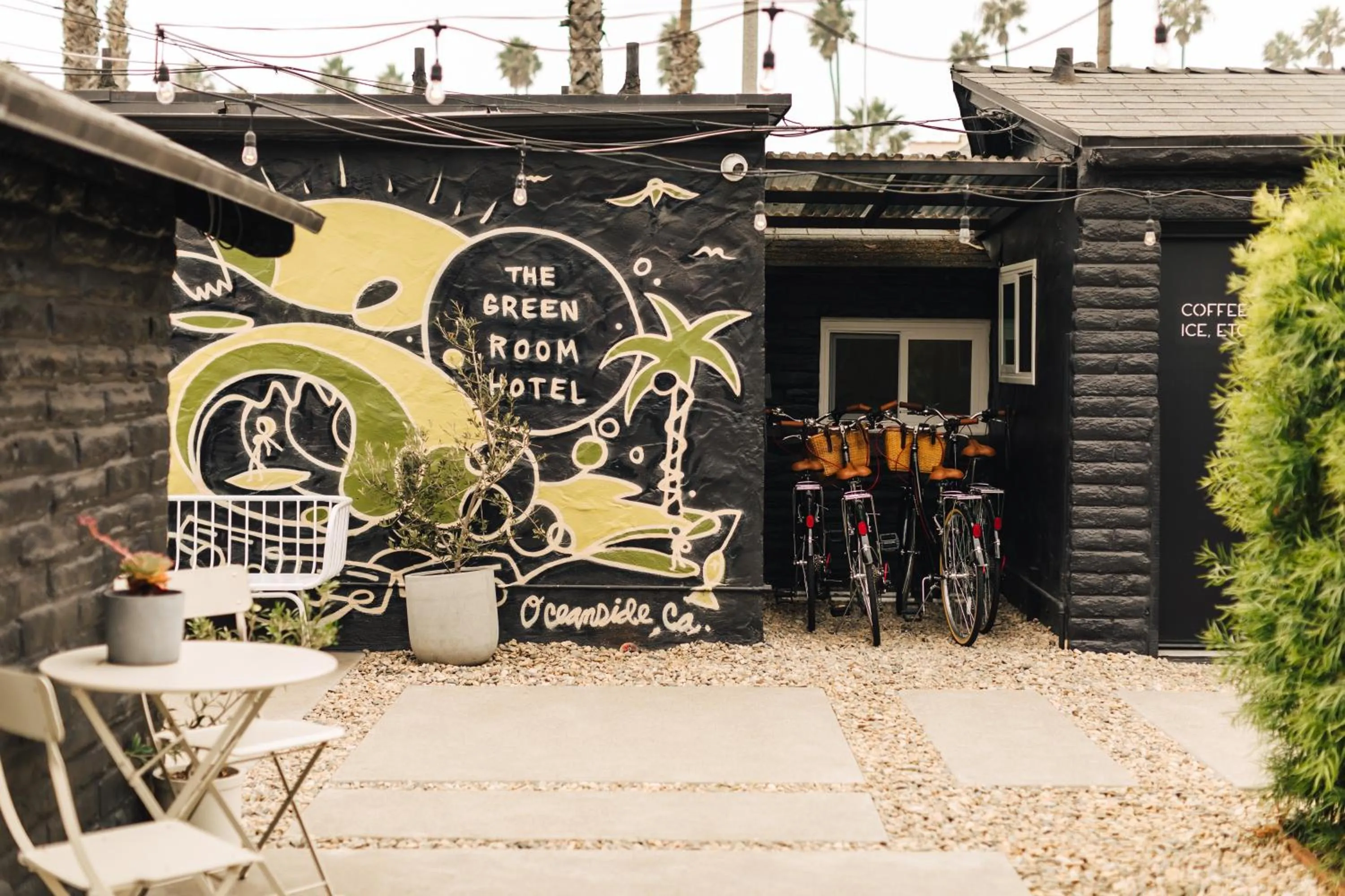 Property building in The Green Room Hotel