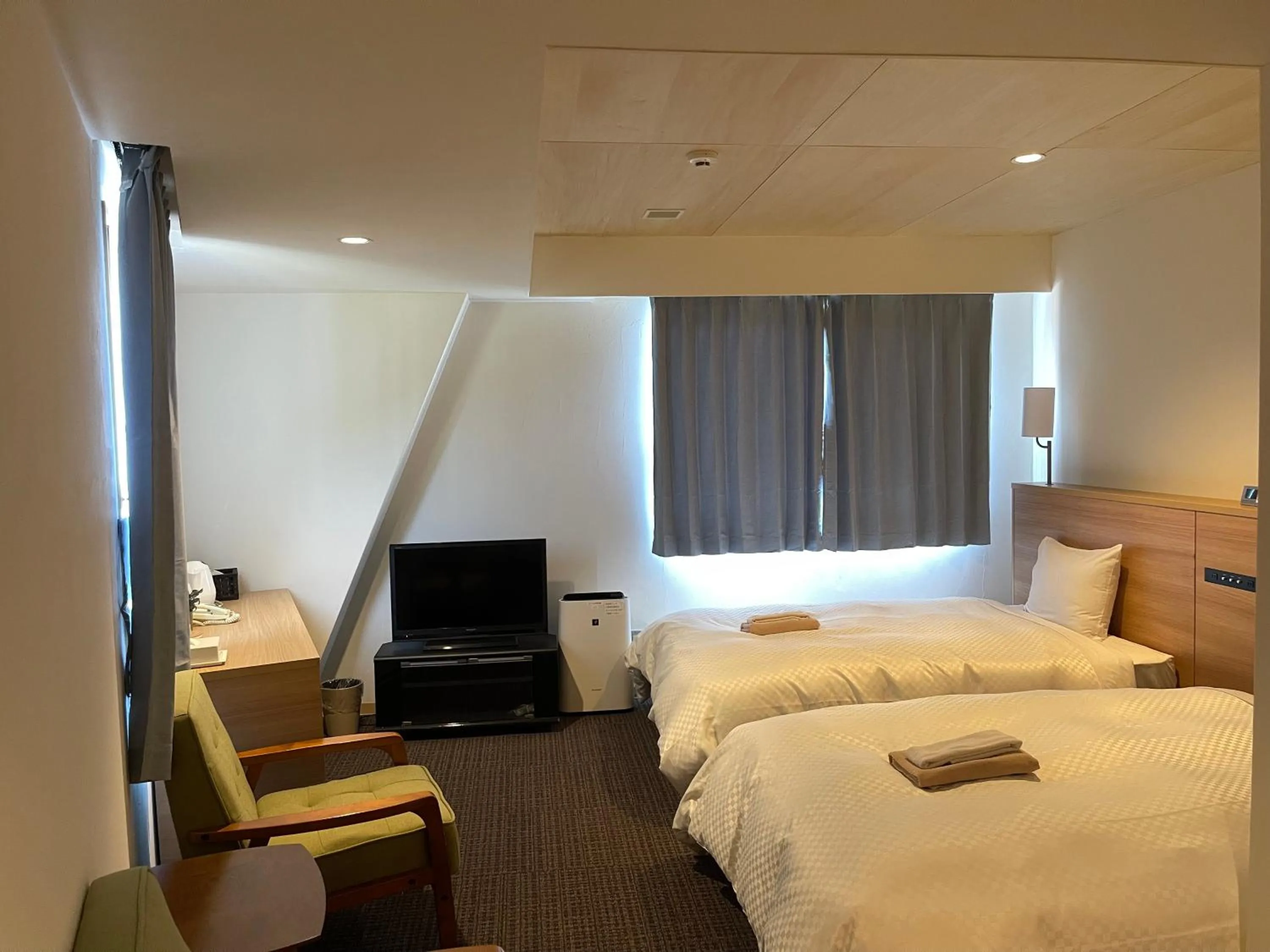 Bed in Amakusa Onsen Hotel Shikisakikan