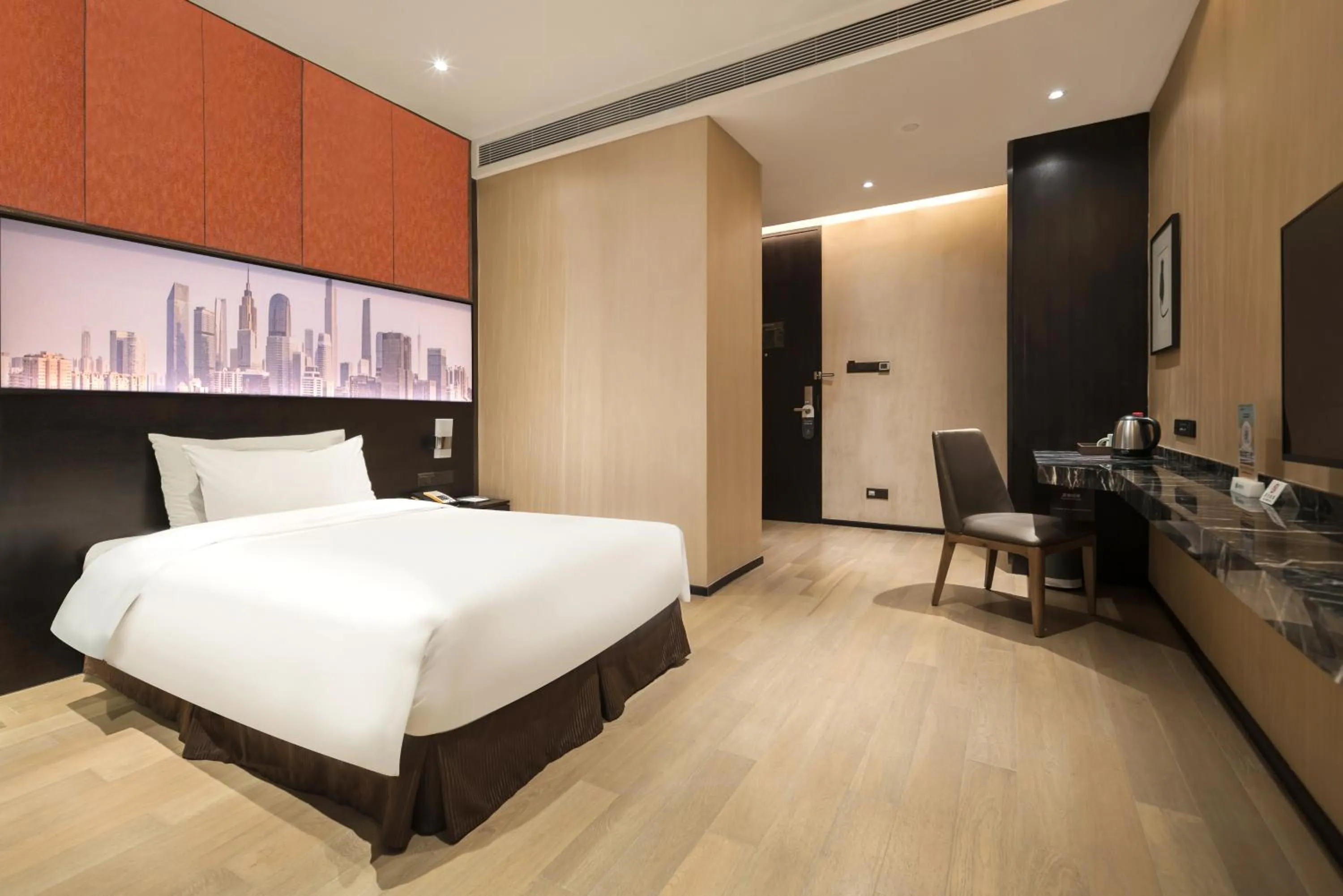 Photo of the whole room, Bed in The Mulian Hotel Guangzhou Zhujiang New Town-Canton Fair Free Shuttle Bus