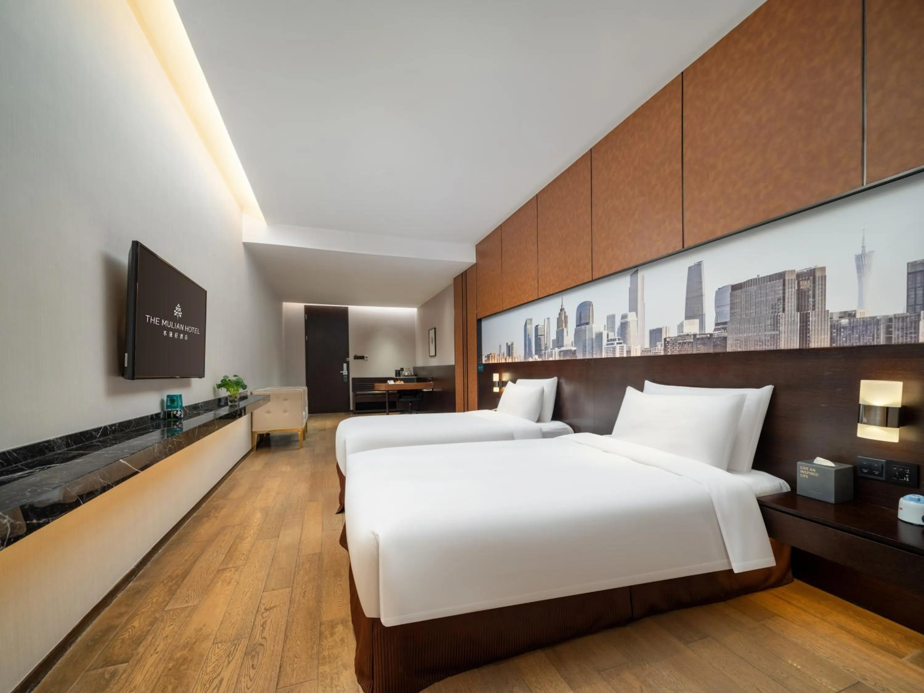 Photo of the whole room, Bed in The Mulian Hotel Guangzhou Zhujiang New Town-Canton Fair Free Shuttle Bus