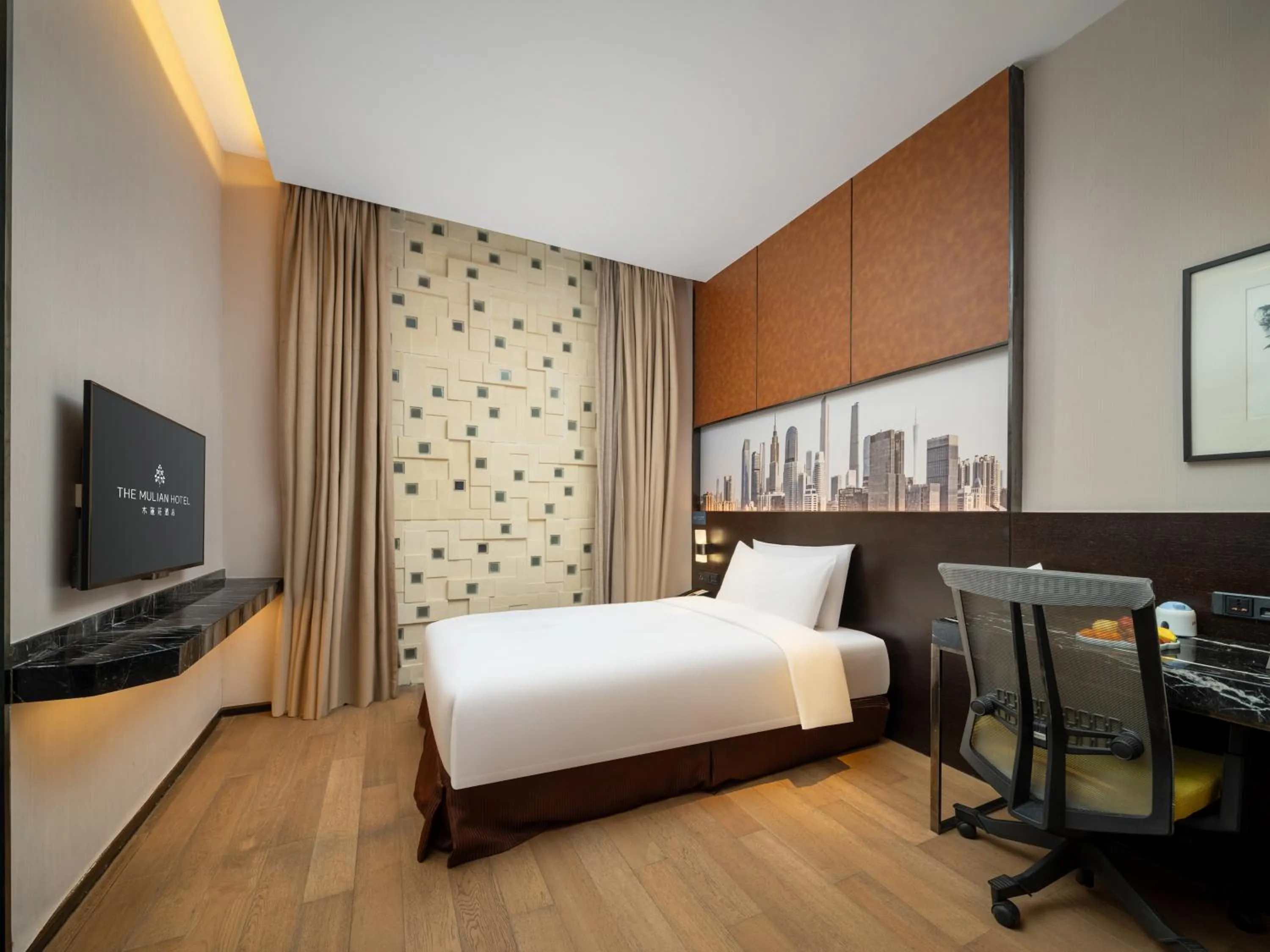 Photo of the whole room, Bed in The Mulian Hotel Guangzhou Zhujiang New Town-Canton Fair Free Shuttle Bus