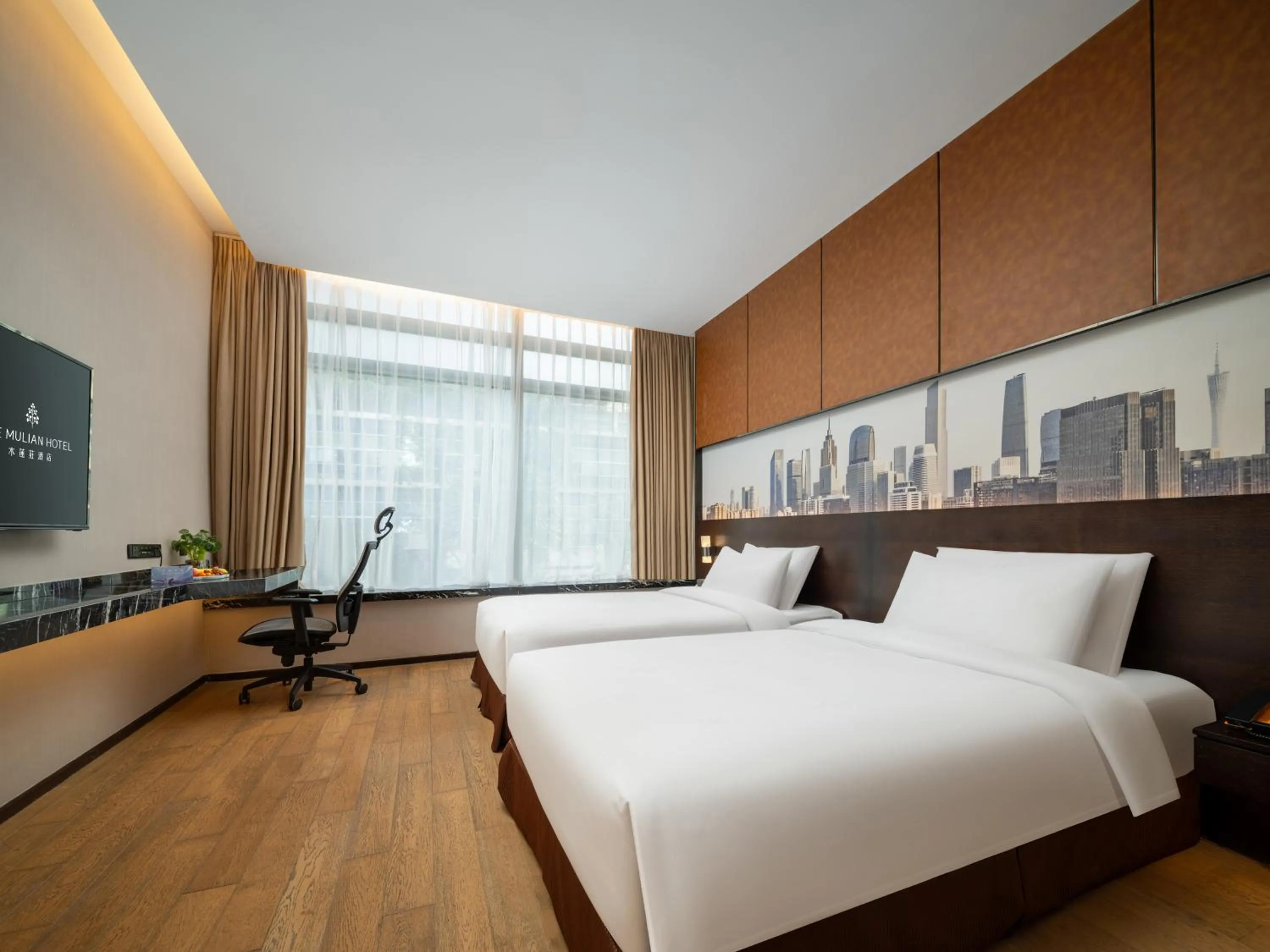 Photo of the whole room, Bed in The Mulian Hotel Guangzhou Zhujiang New Town-Canton Fair Free Shuttle Bus