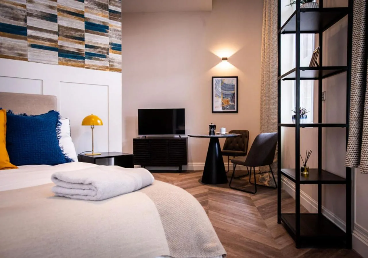 Bed in The Gresham Aparthotel