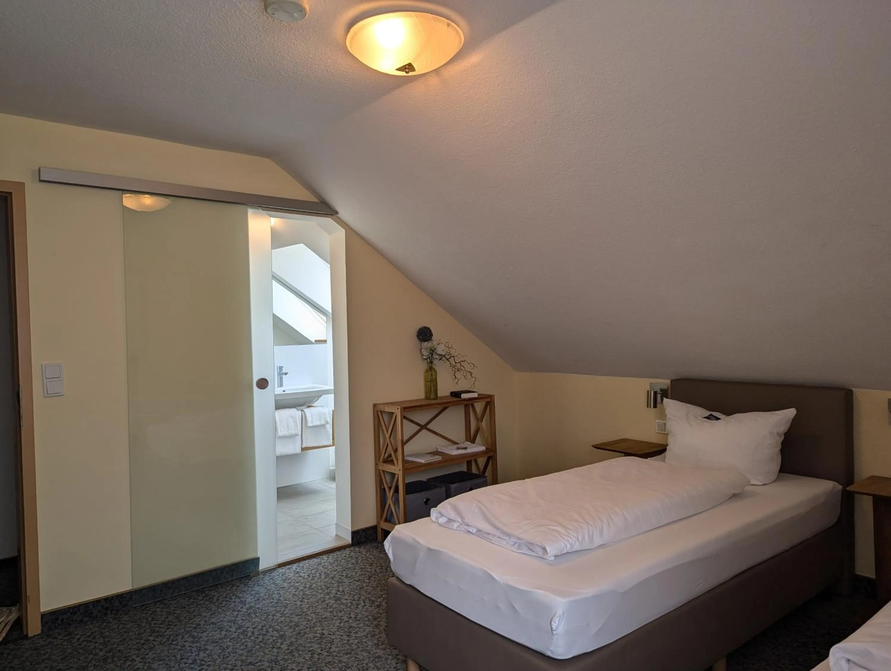 Photo of the whole room, Bed in Landhotel Karrenberg