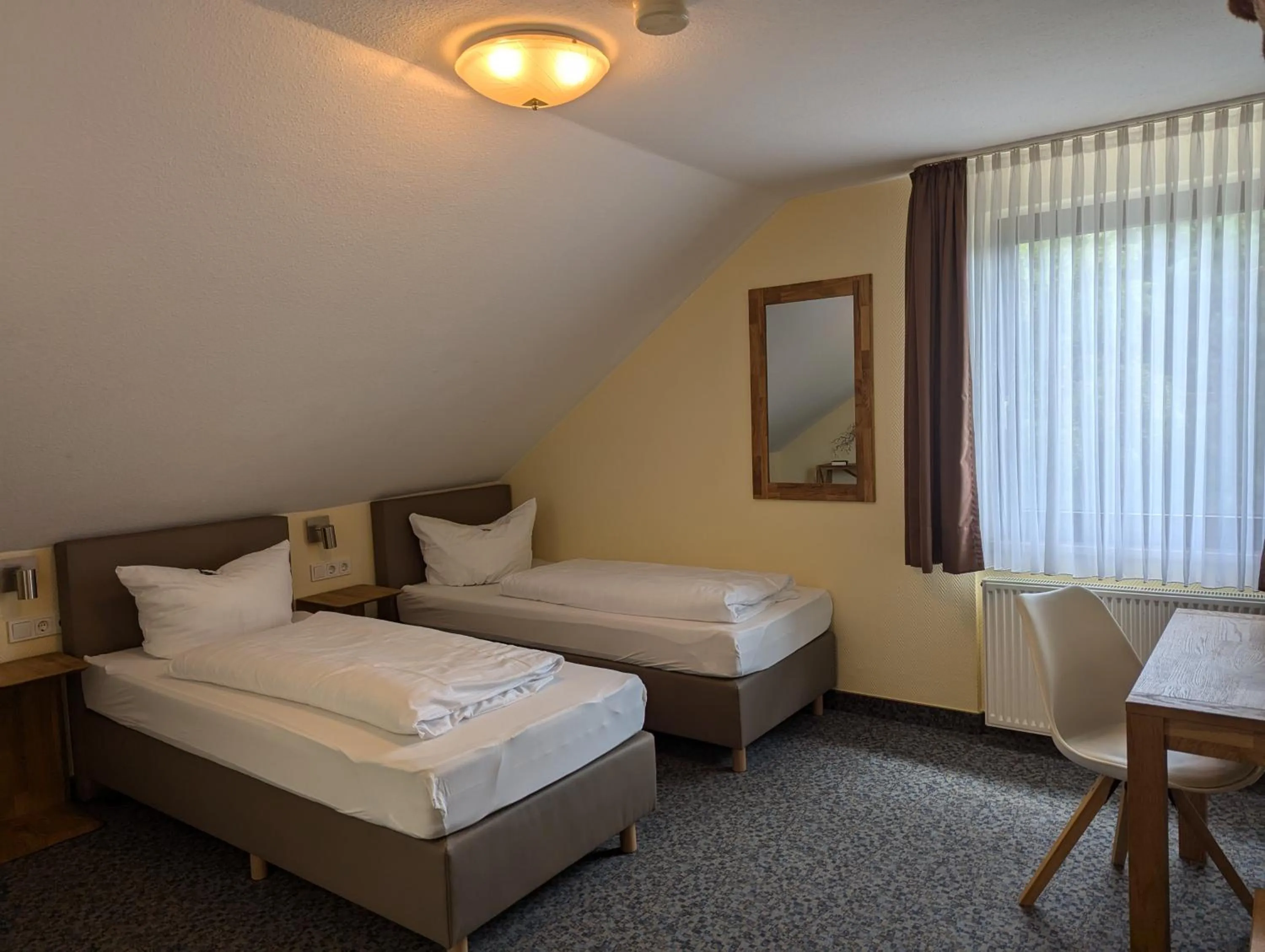 Photo of the whole room, Bed in Landhotel Karrenberg