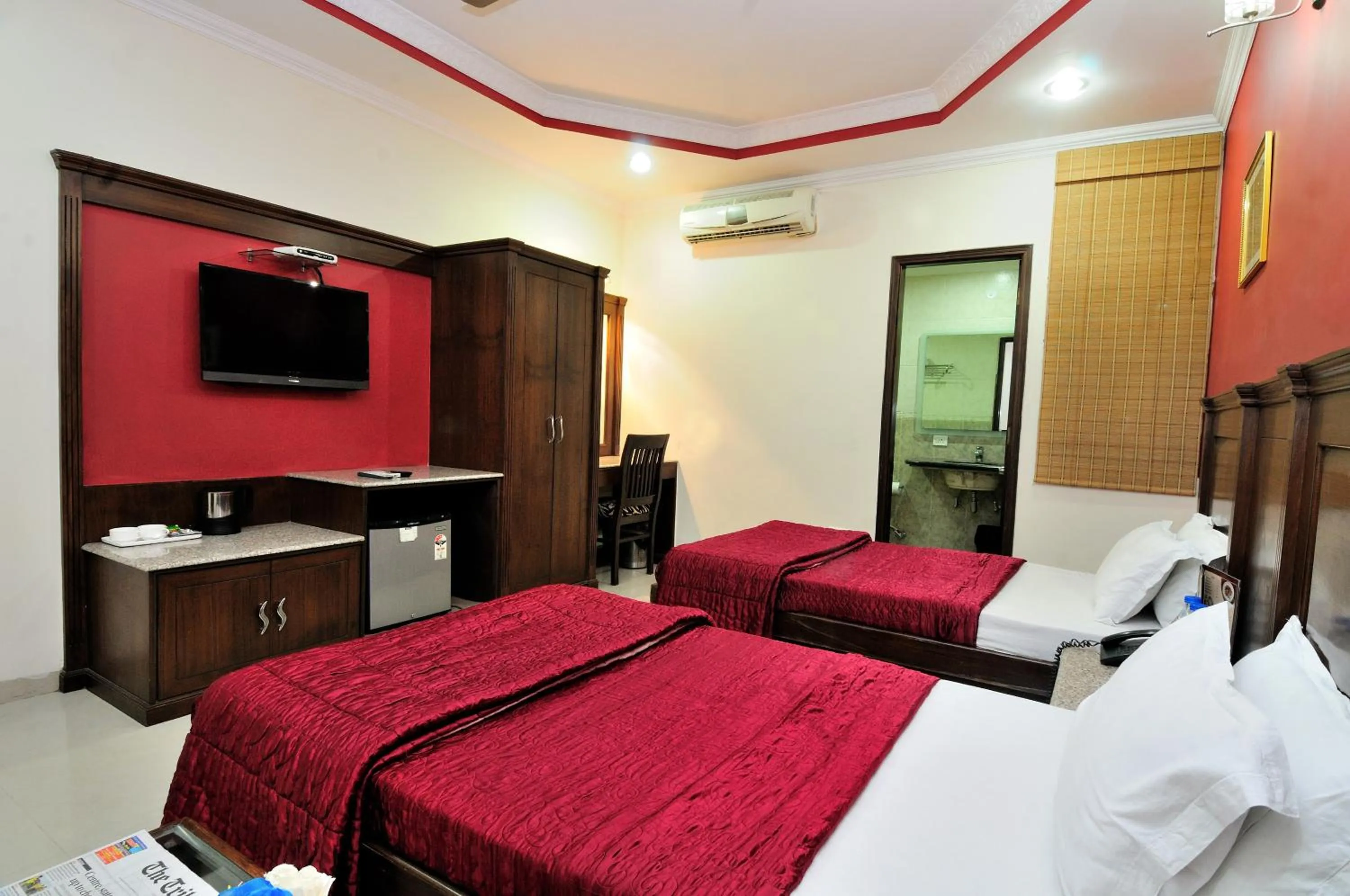 Bed in Hotel Maharaja Residency