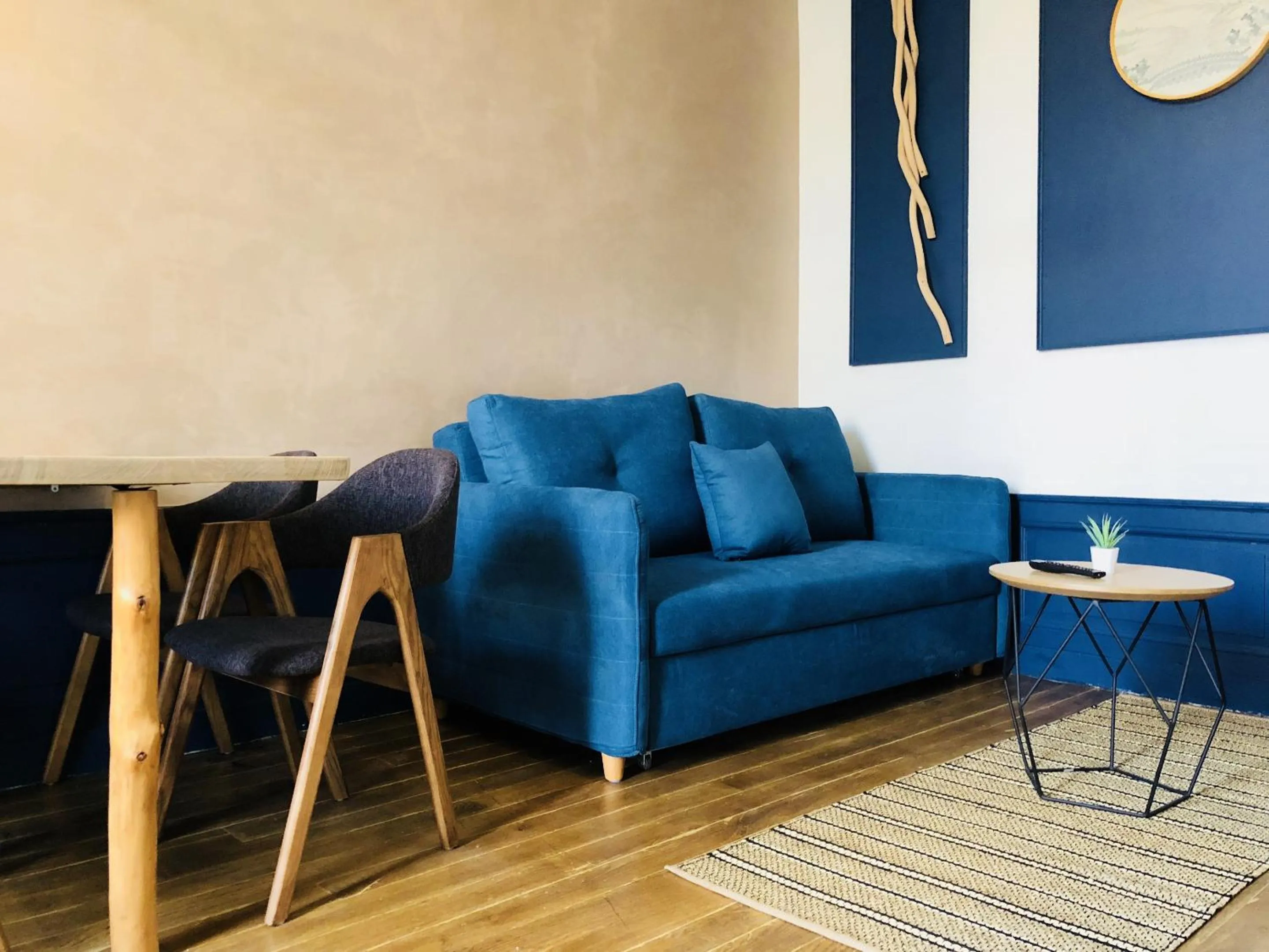 Living room in Meublés de l'Arsenal cœur de ville !