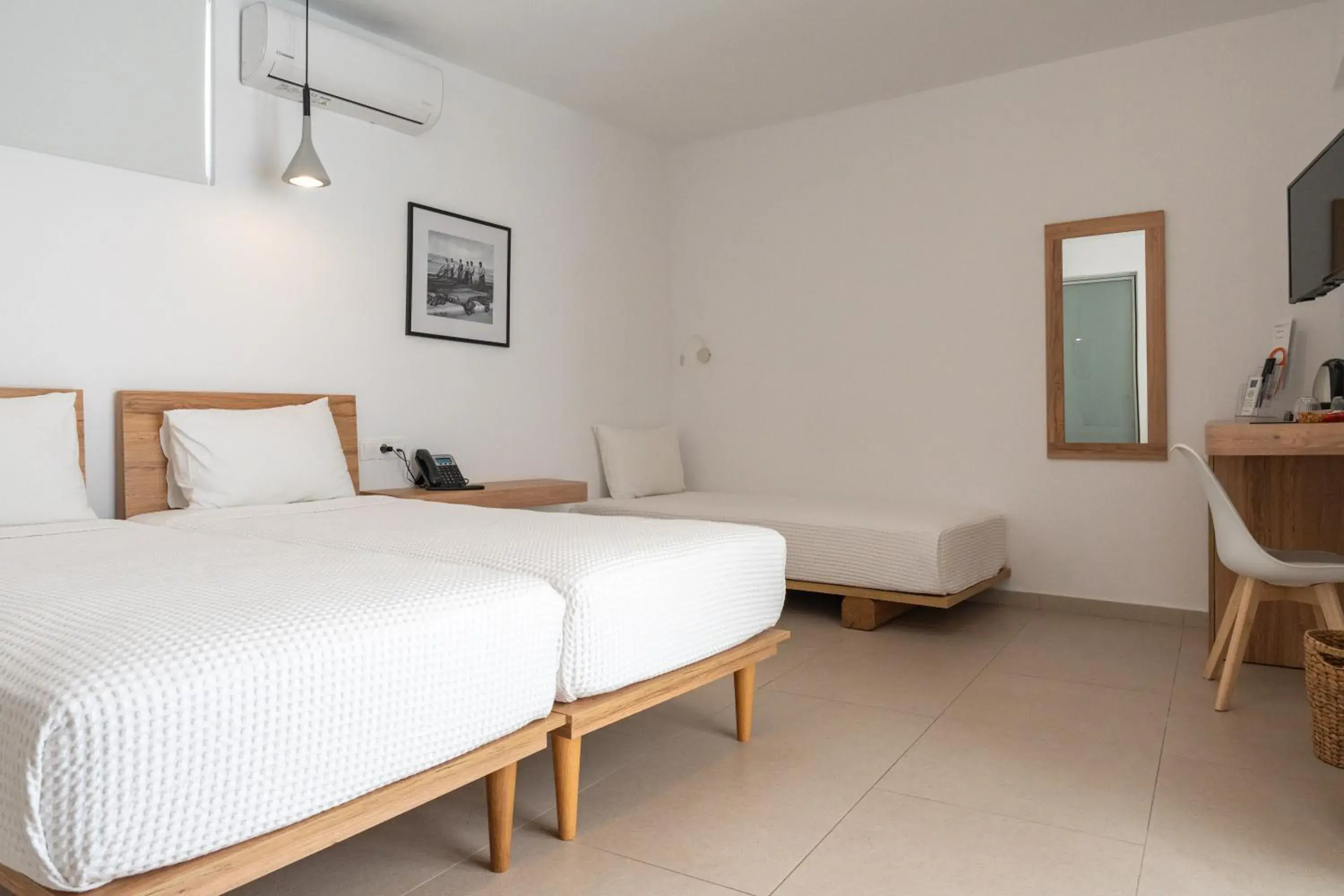 Triple Room with Patio in Sea Breeze Hotel Triple Room with Patio in Sea Breeze Hotel