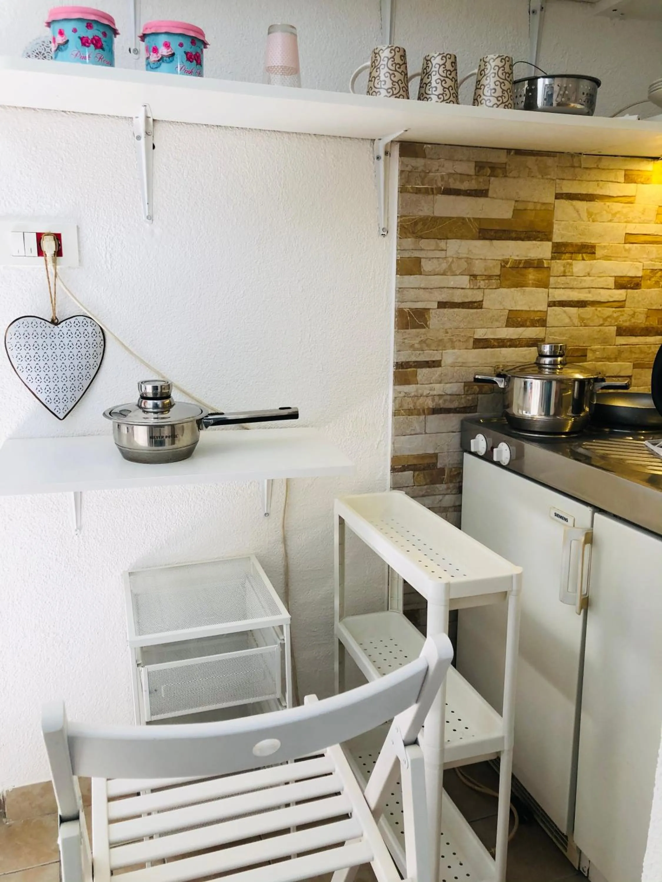 Communal kitchen in Apartman Indira