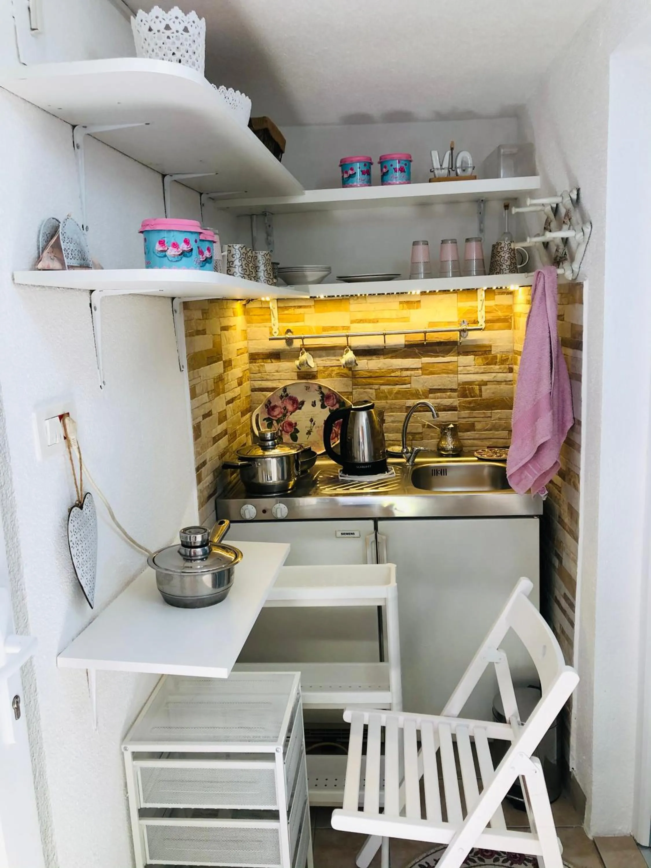 Kitchen or kitchenette in Apartman Indira