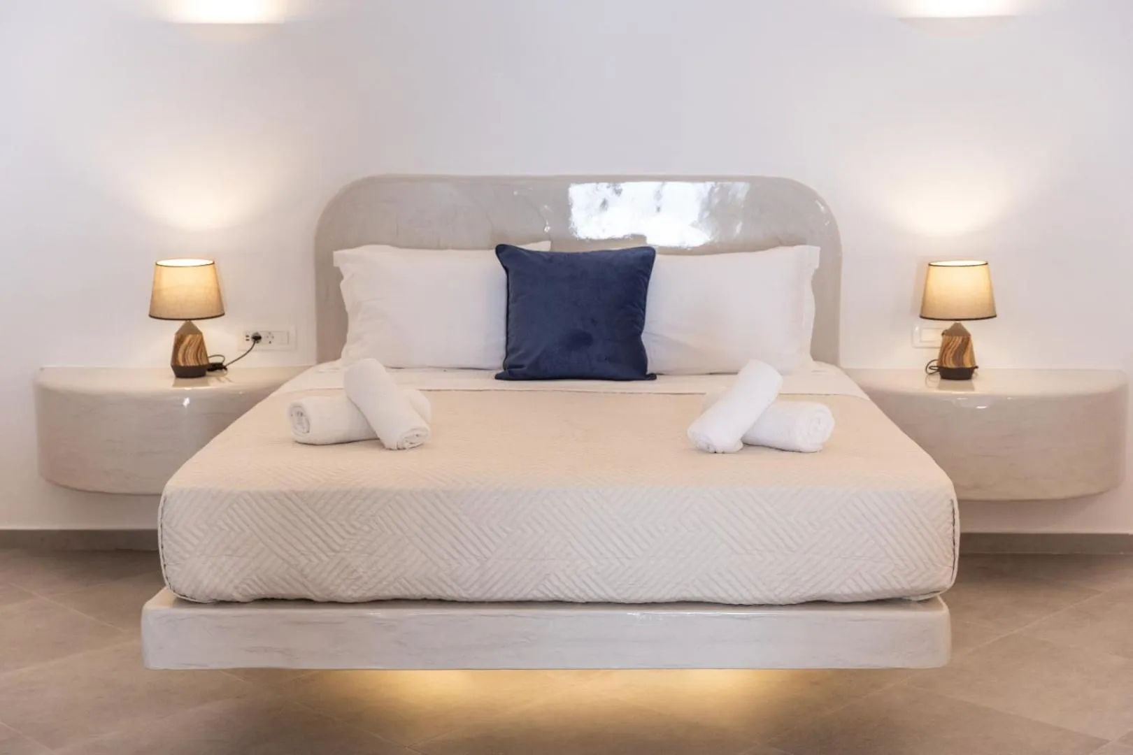 Bed in Sun Angelos Oia - Luxury Cave Suites