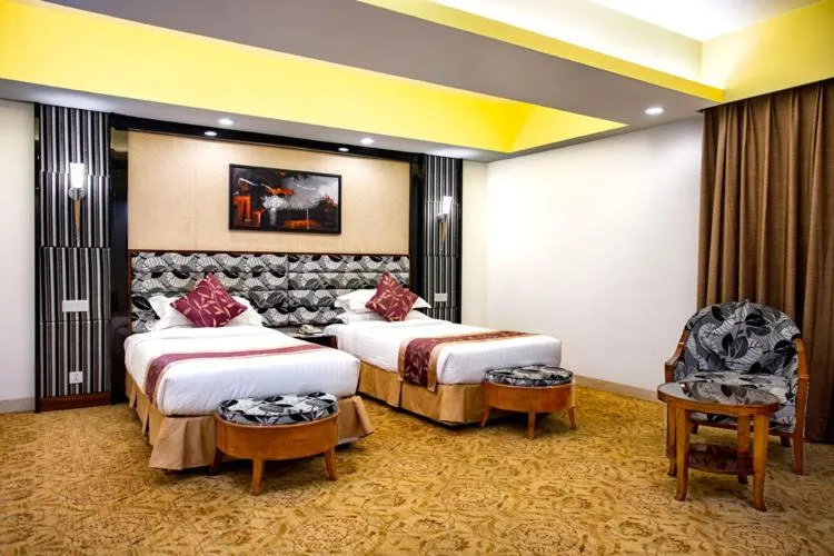 Bed in Hotel Star Pacific