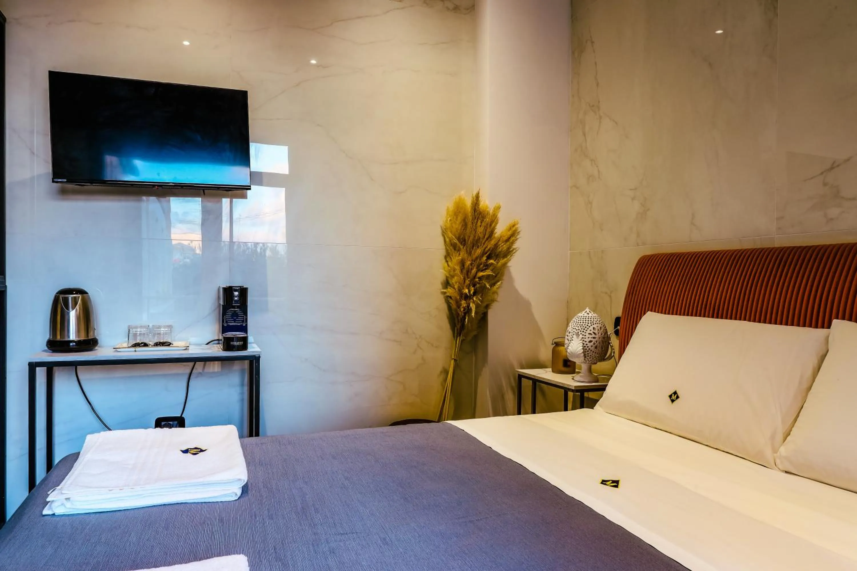 Bed in Marmur luxury room